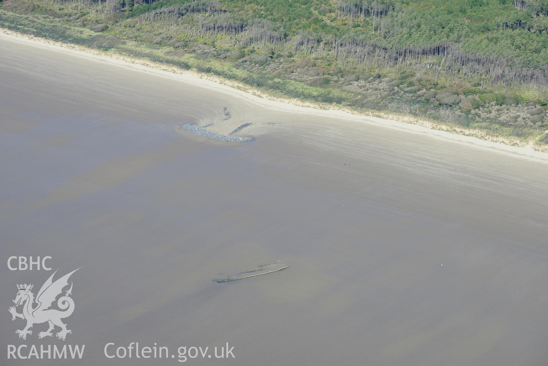 An unnamed wreck on the southern part of the Cefn Sidan Sands near Pembrey, Llanelli. Oblique aerial photograph taken during the Royal Commission's programme of archaeological aerial reconnaissance by Toby Driver on 30th September 2015.