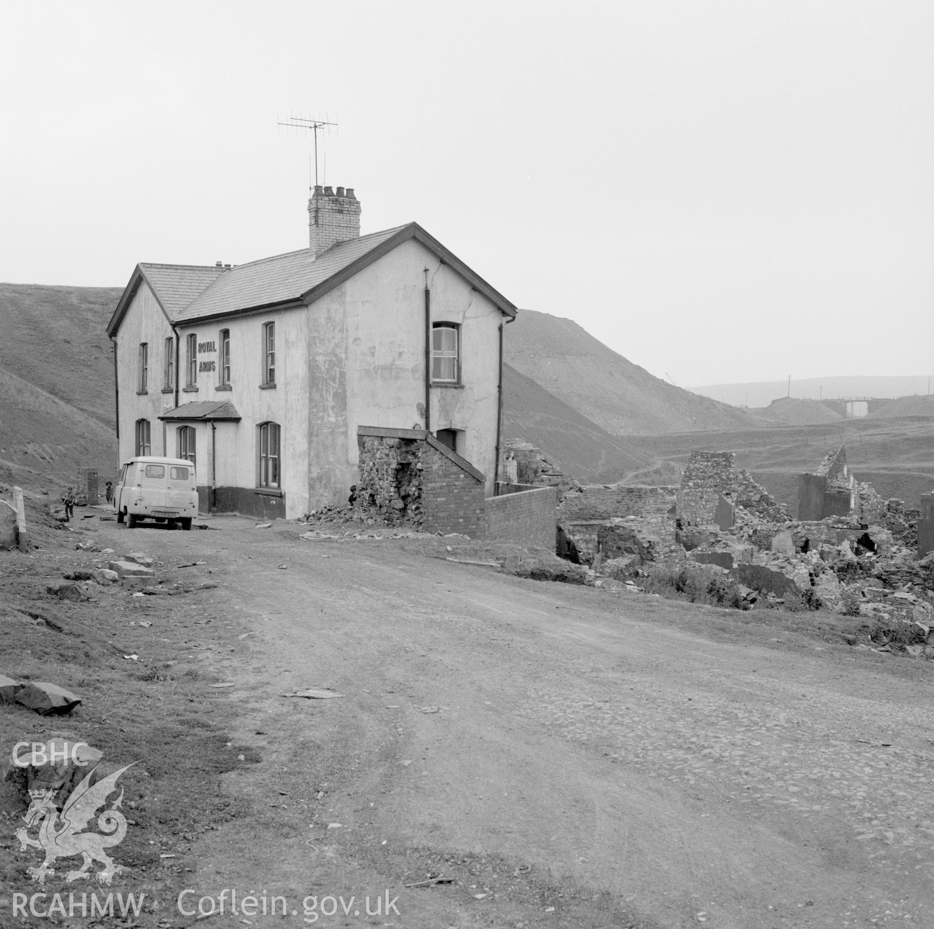 Digital copy of a black and white negative showing Royal Arms Hotel, taken by Douglas Hague, undated.