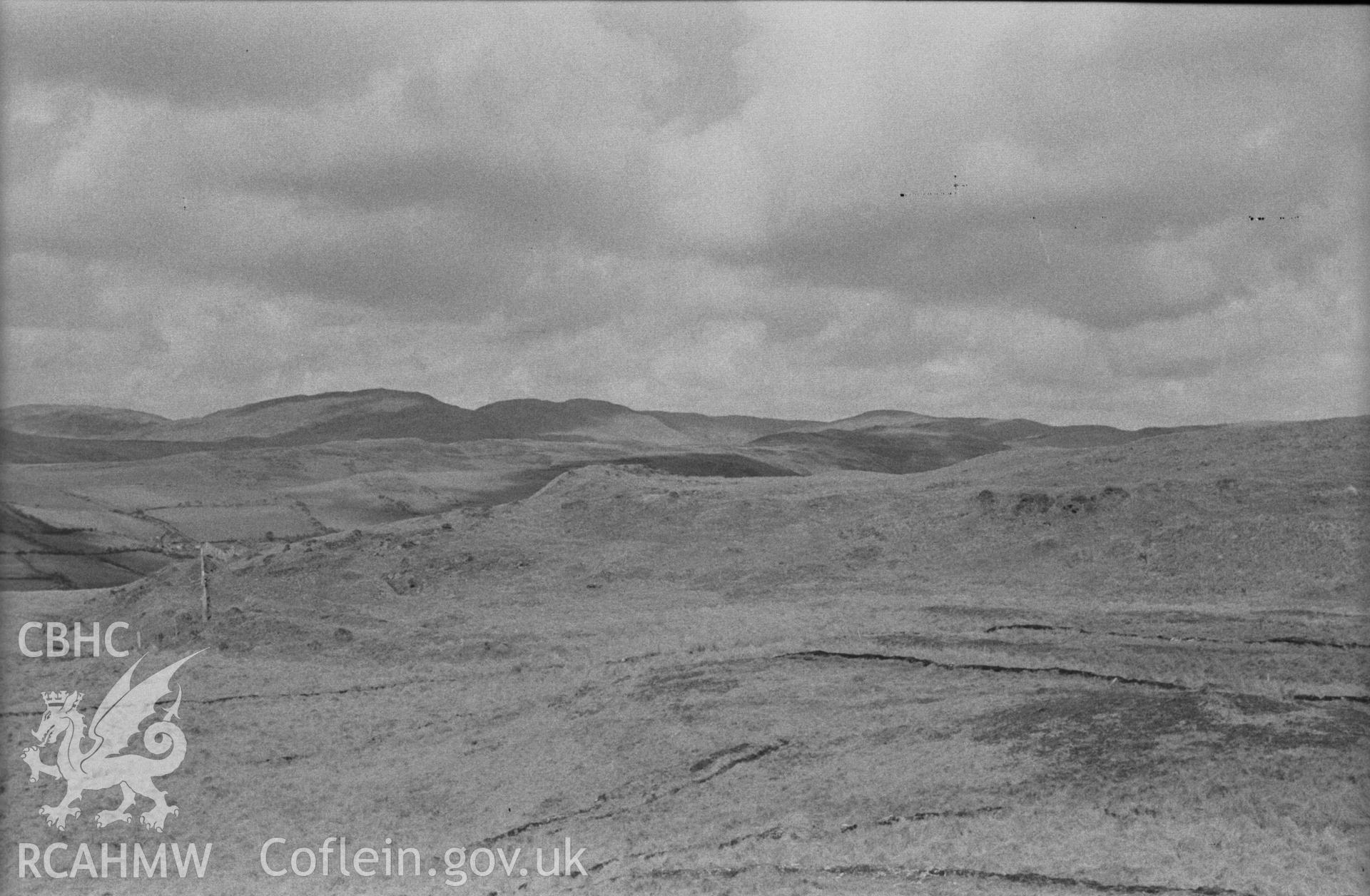Digital copy of a black and white negative showing view of Pen Dinas, Elerch, with entrance on right. Photographed in April 1963 by Arthur O. Chater from Grid Reference SN 6764 8767, looking east. Panorama 1 of 3 photographs.
