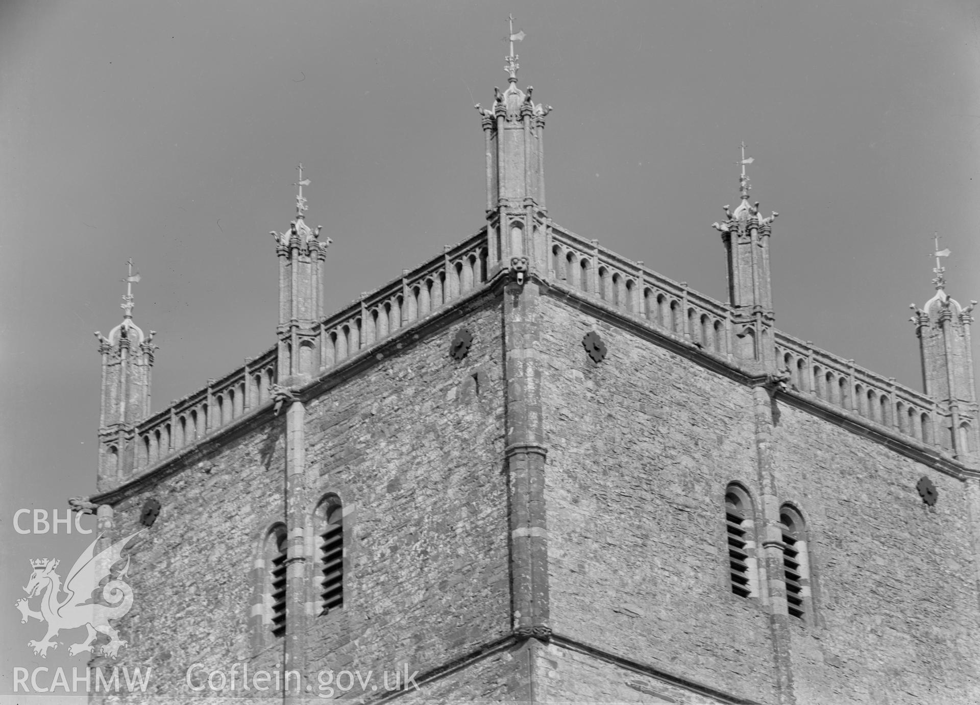 Digital copy of a black and white nitrate negative showing exterior detail of the tower at St. David's Cathedral, taken by E.W. Lovegrove, July 1936.