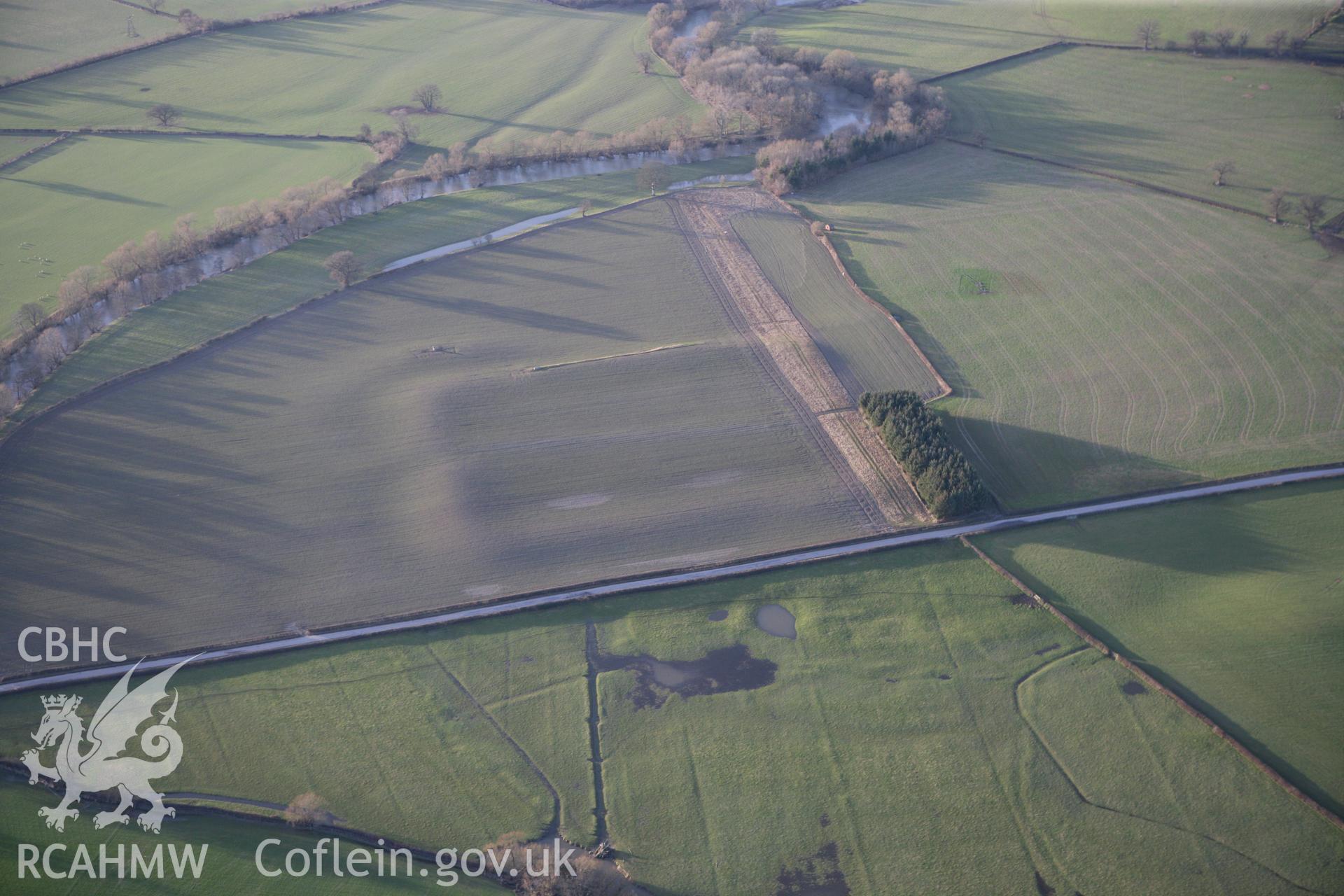 RCAHMW colour oblique photograph of Forden Gaer Roman Fort. Taken by Toby Driver on 08/02/2011.