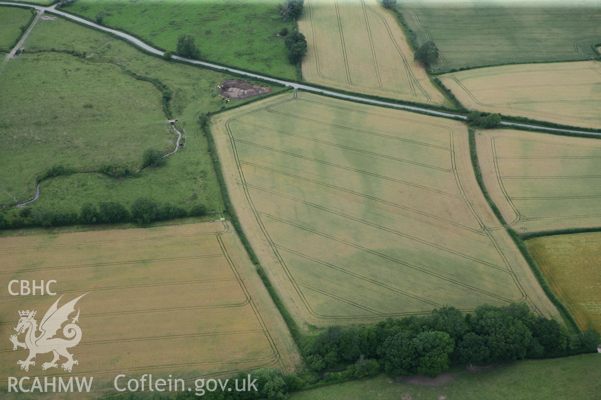 RCAHMW colour oblique photograph of Penthryn Fechan cropmarks. Taken by Toby Driver on 20/07/2011.