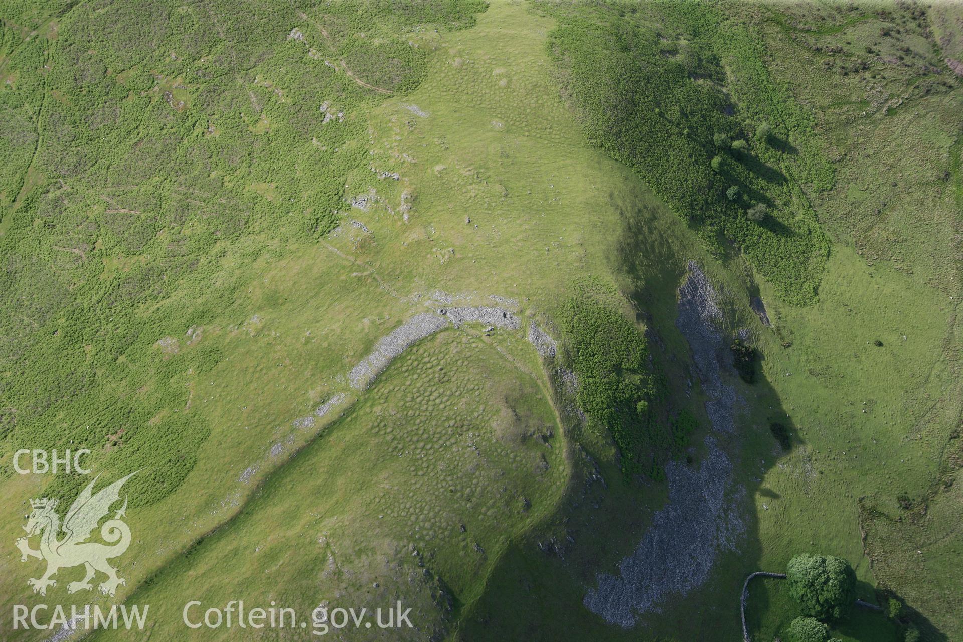 RCAHMW colour oblique photograph of Castle Bank hillfort. Taken by Toby Driver on 13/06/2011.
