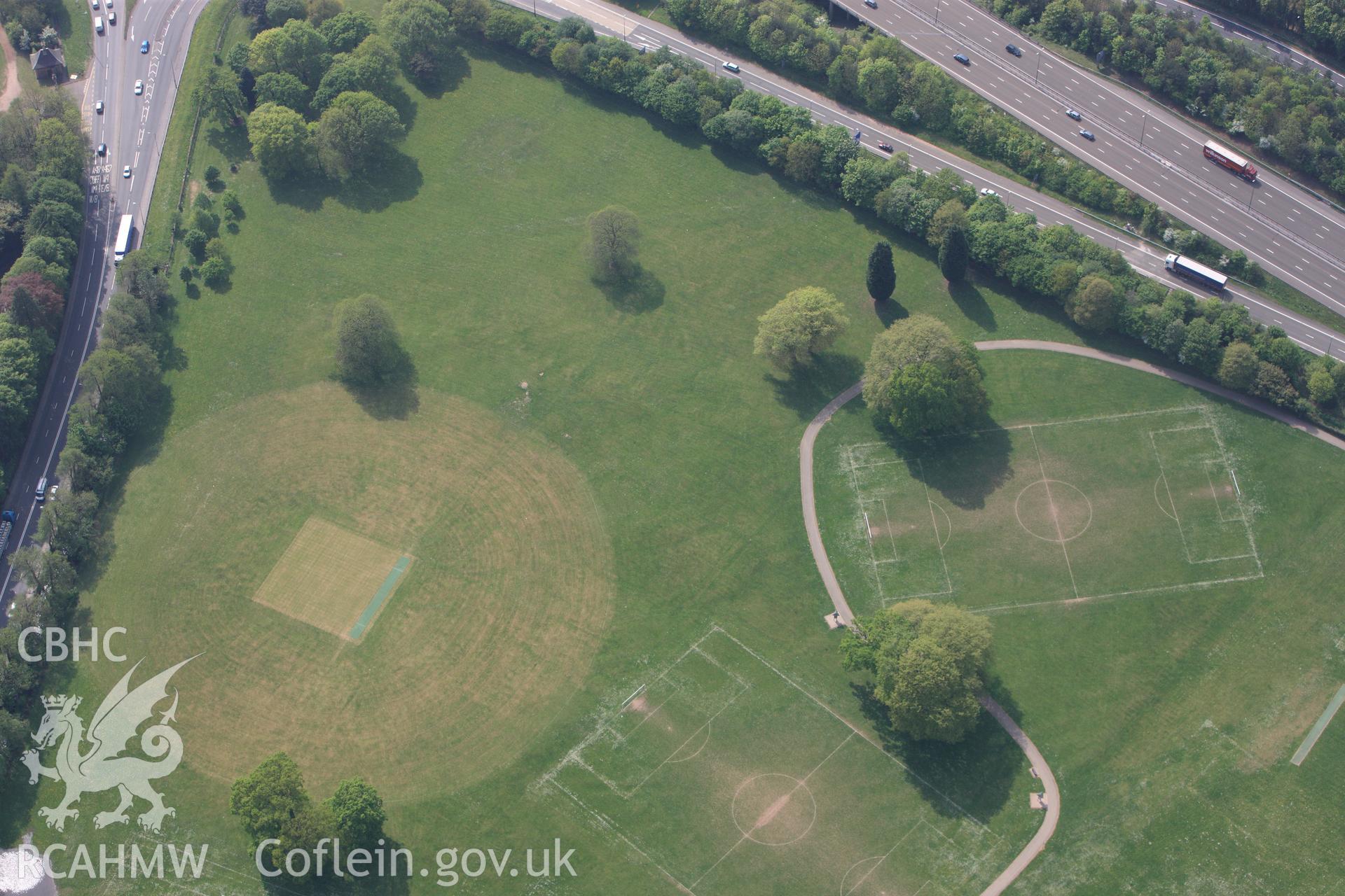 RCAHMW colour oblique photograph of Tredegar, sports fields with non-archaeological parch marks. Taken by Toby Driver on 26/04/2011.