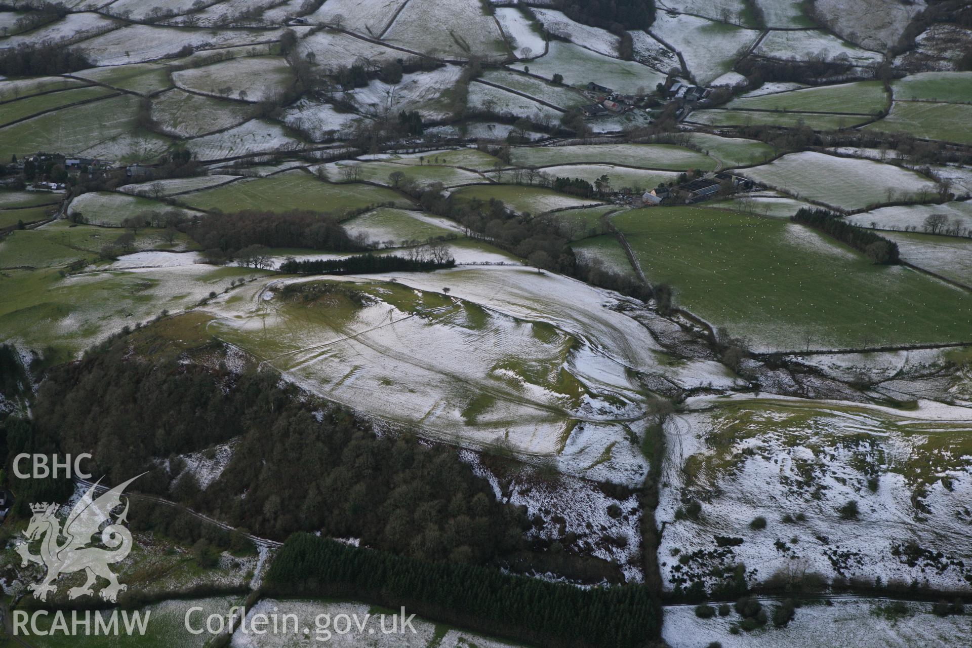 RCAHMW colour oblique photograph of Graig Fawr camp, hillfort. Taken by Toby Driver on 18/12/2011.