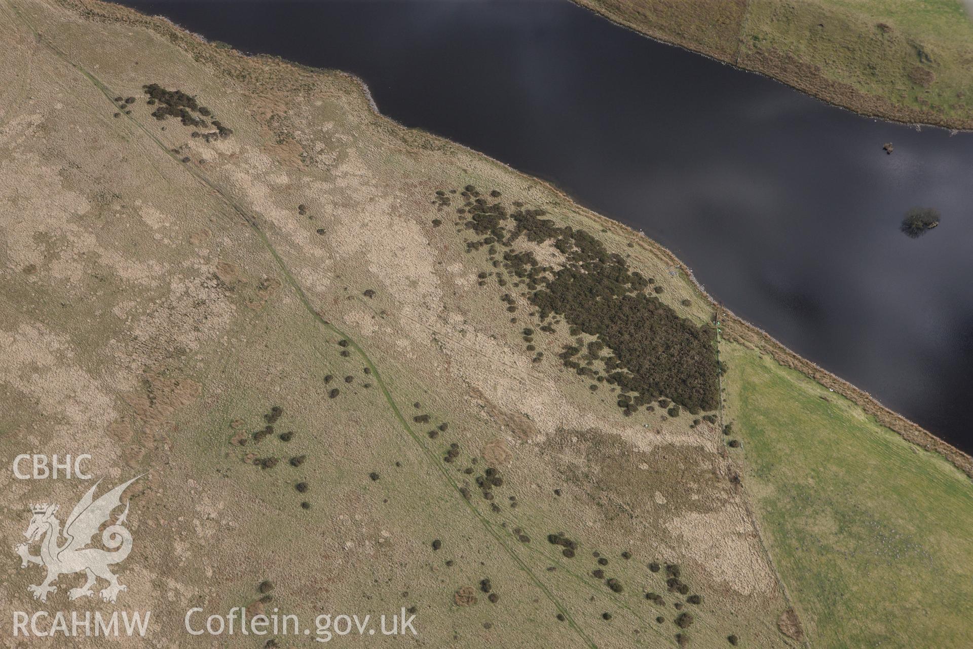 RCAHMW colour oblique photograph of Llyn y Tarw Cairn. Taken by Toby Driver on 22/03/2011.