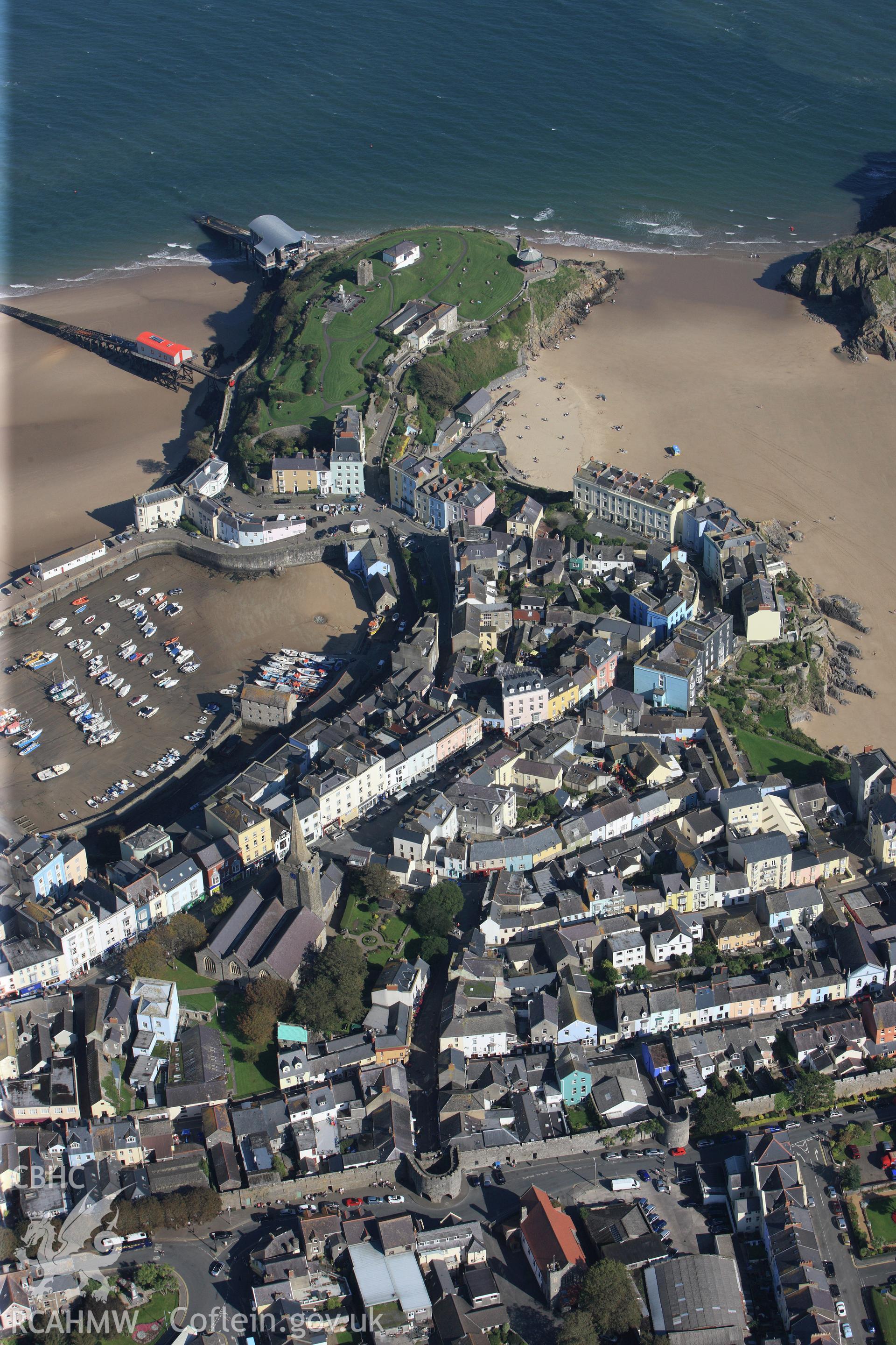 RCAHMW colour oblique photograph of Tenby, looking towards the town wall, St Mary's Church and the harbour. Taken by Toby Driver and Oliver Davies on 28/09/2011.