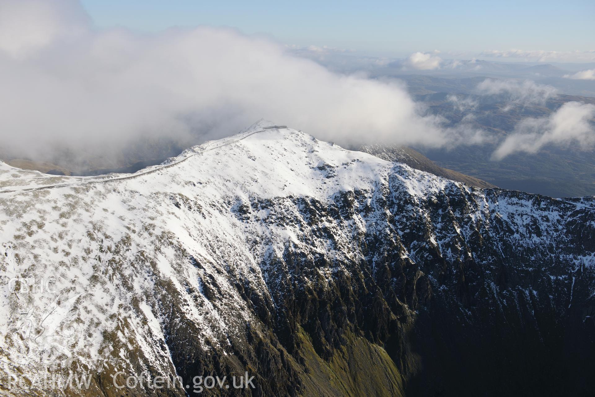 RCAHMW colour oblique photograph of Snowdon range, with Snowdon summit from the northwest, under snow. Taken by Toby Driver on 10/12/2012.