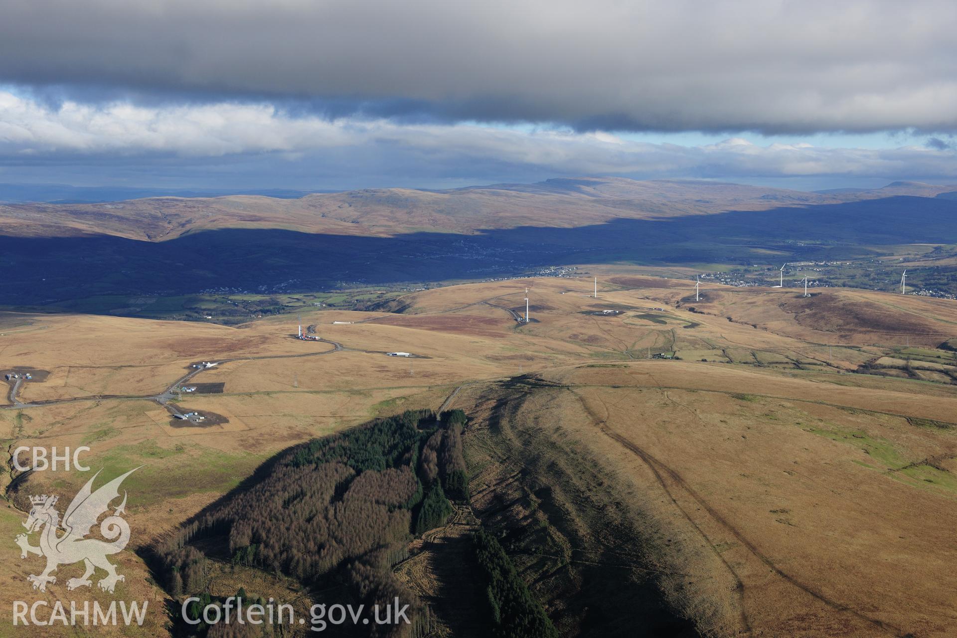 RCAHMW colour oblique photograph of Mynydd y Betws windfarm, general view from south-west. Taken by Toby Driver on 28/11/2012.