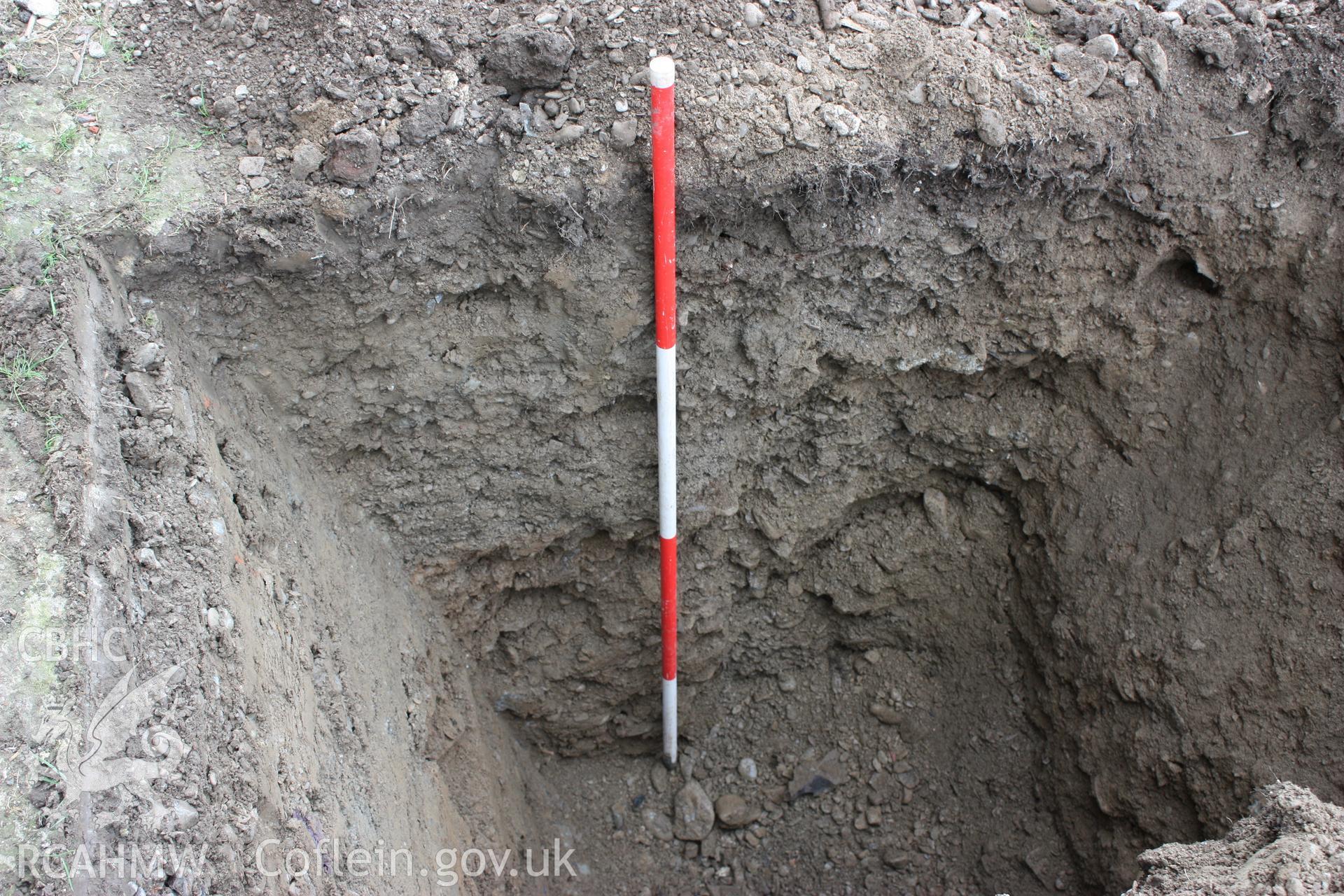 Digital photograph showing Sondage 1 in swimming pool development area - part of archaeological field evaluation at Trawscoed Mansion, Trawscoed, produced by Cambrian Archaeological Projects Ltd.