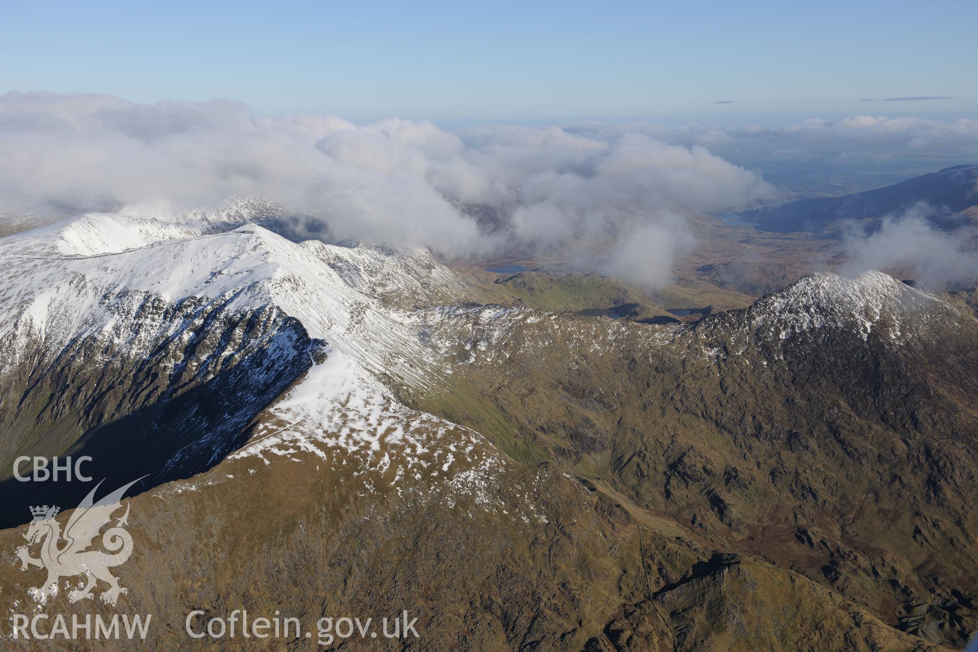 RCAHMW colour oblique photograph of Snowdon summit under snow, view over Bwlch Main. Taken by Toby Driver on 10/12/2012.