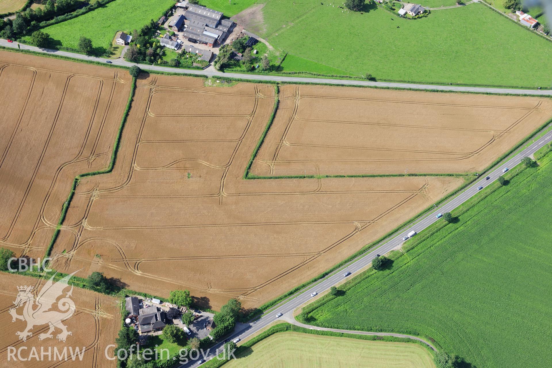 RCAHMW colour oblique photograph of cropmark complex, Lower Rectory Road. Taken by Toby Driver on 10/08/2012.