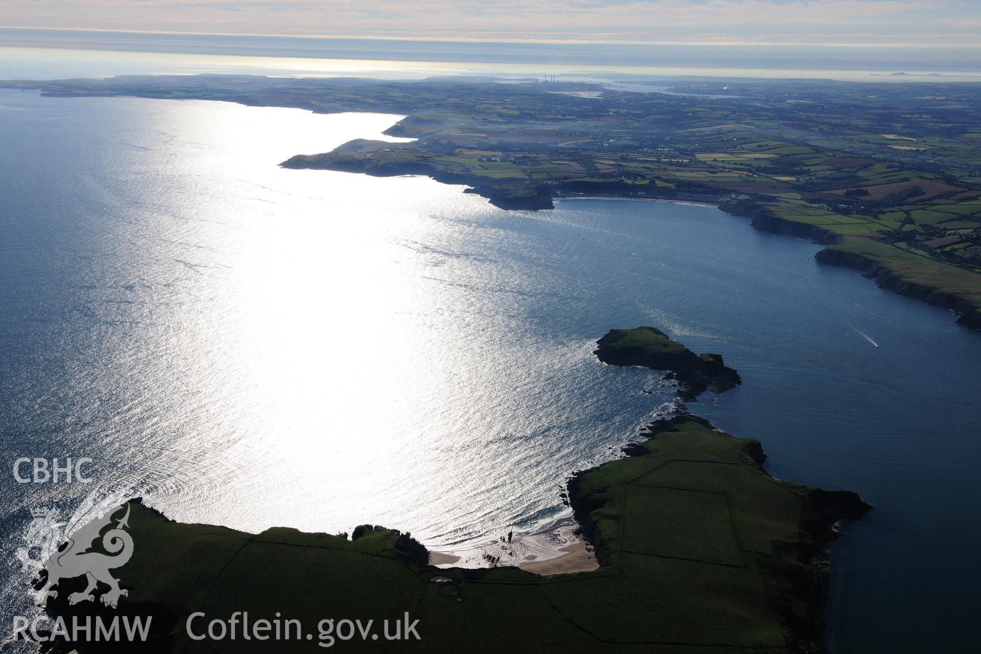RCAHMW colour oblique photograph of Caldey Island, evening landscape west towards Lydstep. Taken by Toby Driver on 24/07/2012.