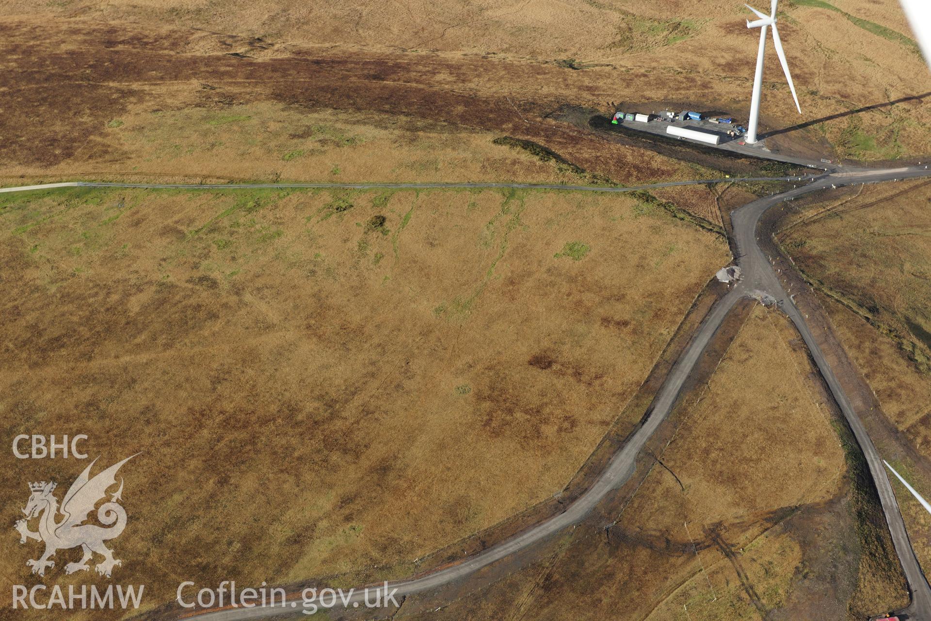 RCAHMW colour oblique photograph of Mynydd y Betws windfarm, view from south-east. Taken by Toby Driver on 28/11/2012.