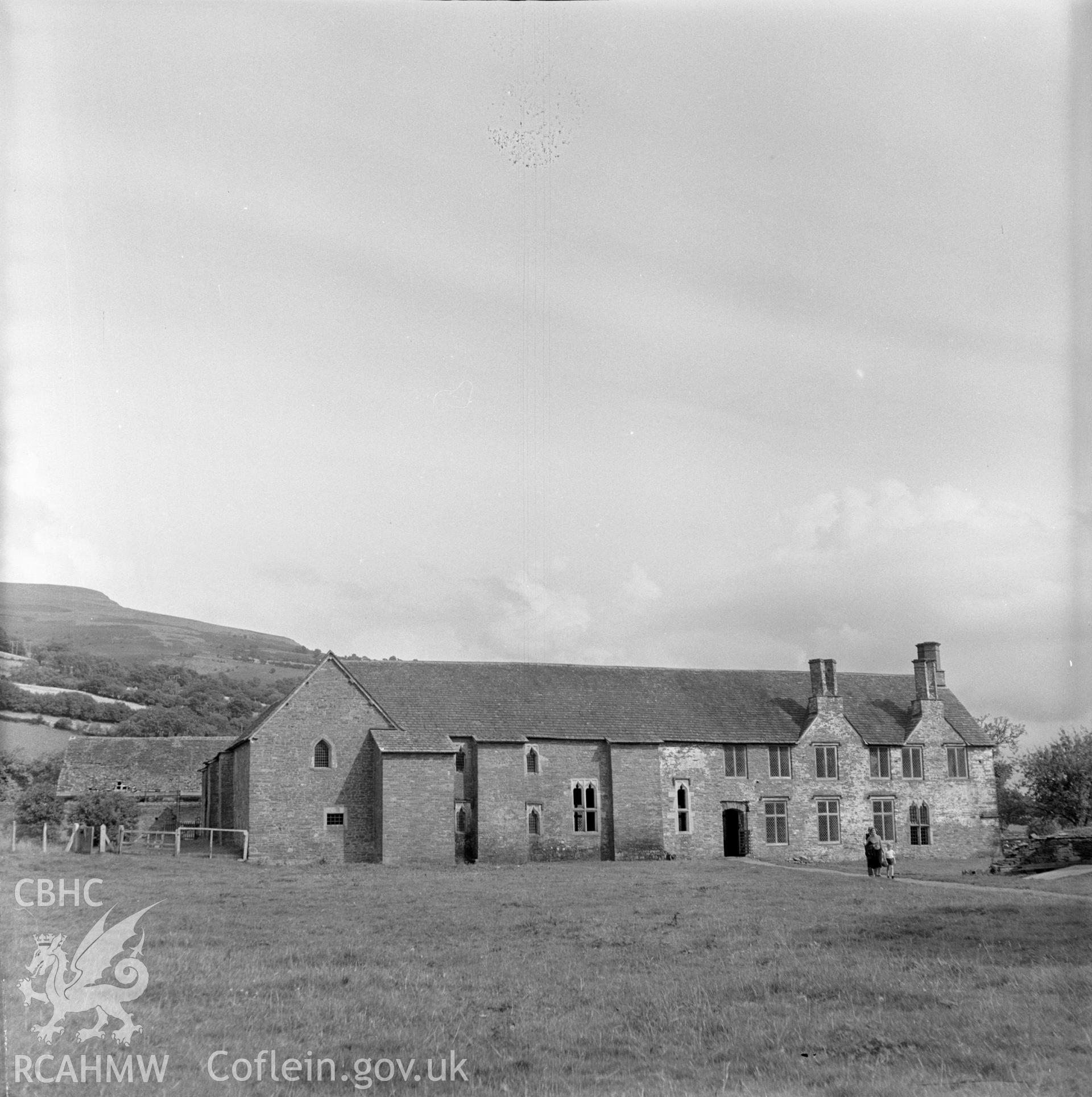 Digital copy of a black and white negative showing Tretower Court and barn.