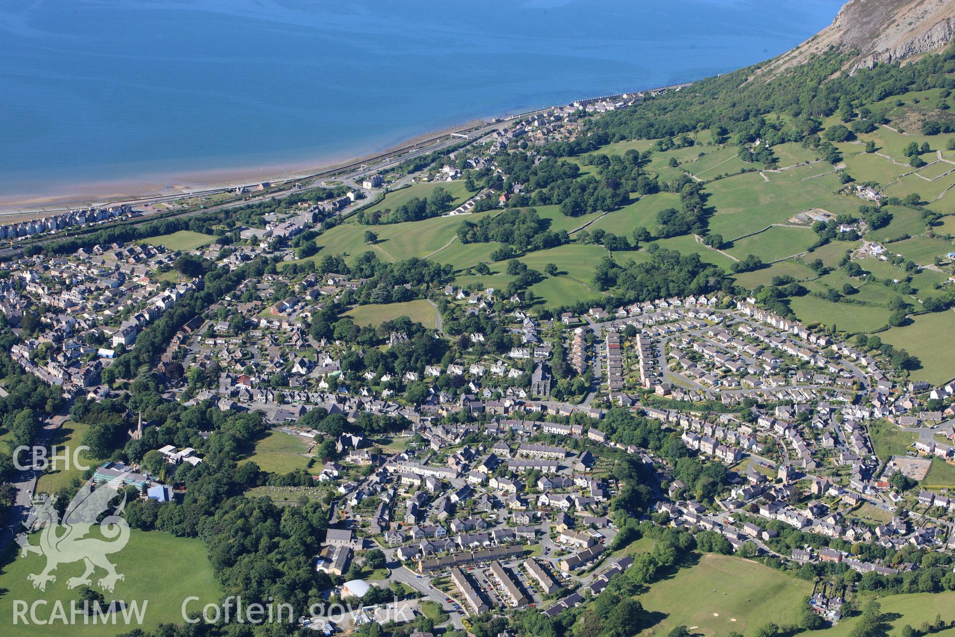 RCAHMW colour oblique photograph of Llanfairfechan, from the south. Taken by Toby Driver on 16/06/2010.