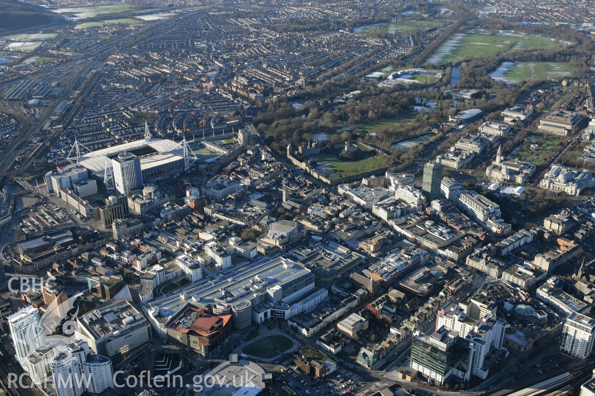 RCAHMW colour oblique photograph of Cardiff city centre from the east, showing the Millenium Stadium. Taken by Toby Driver on 08/12/2010.
