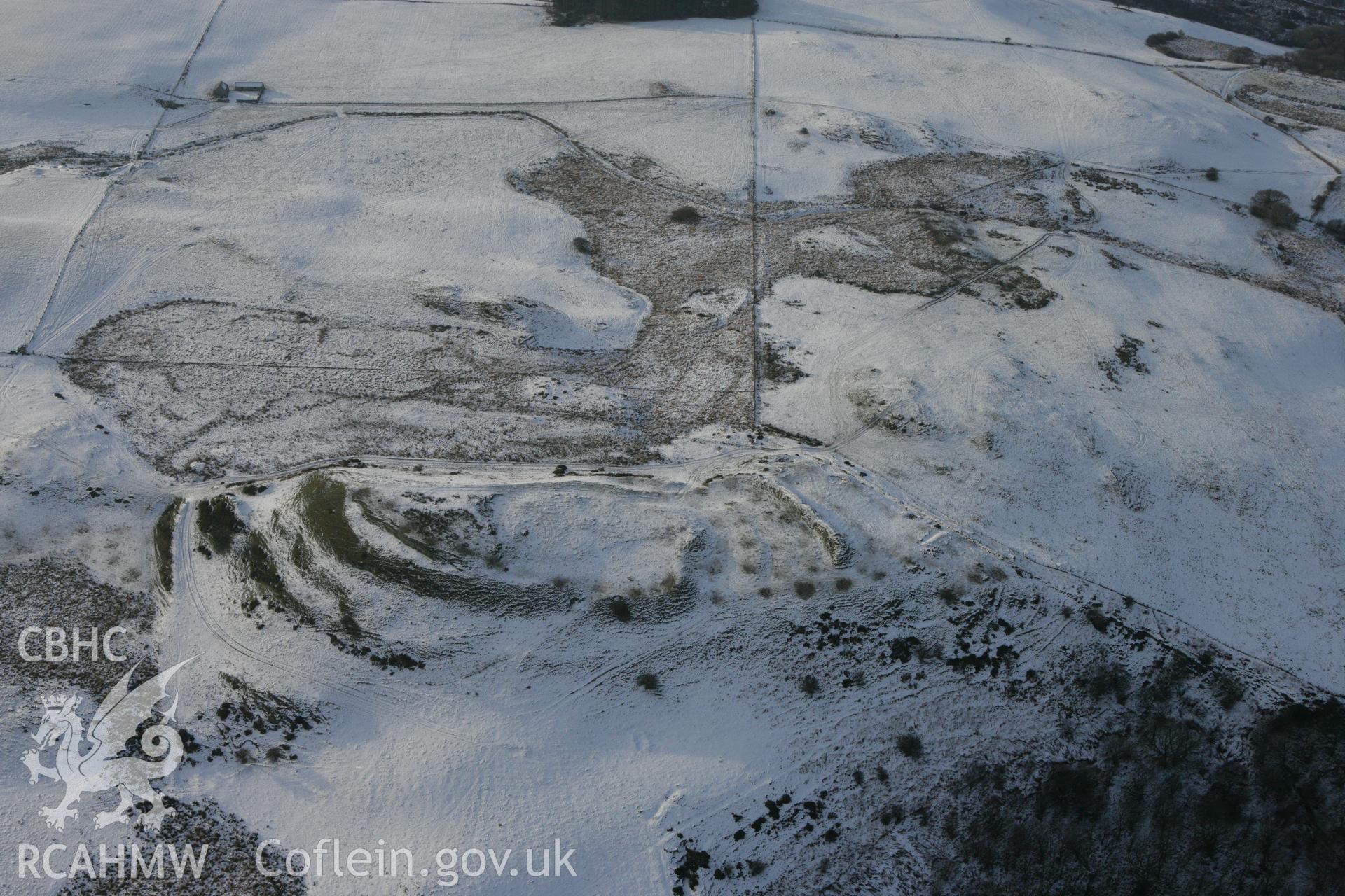 RCAHMW colour oblique photograph of Pen Dinas hillfort. Taken by Toby Driver on 02/12/2010.
