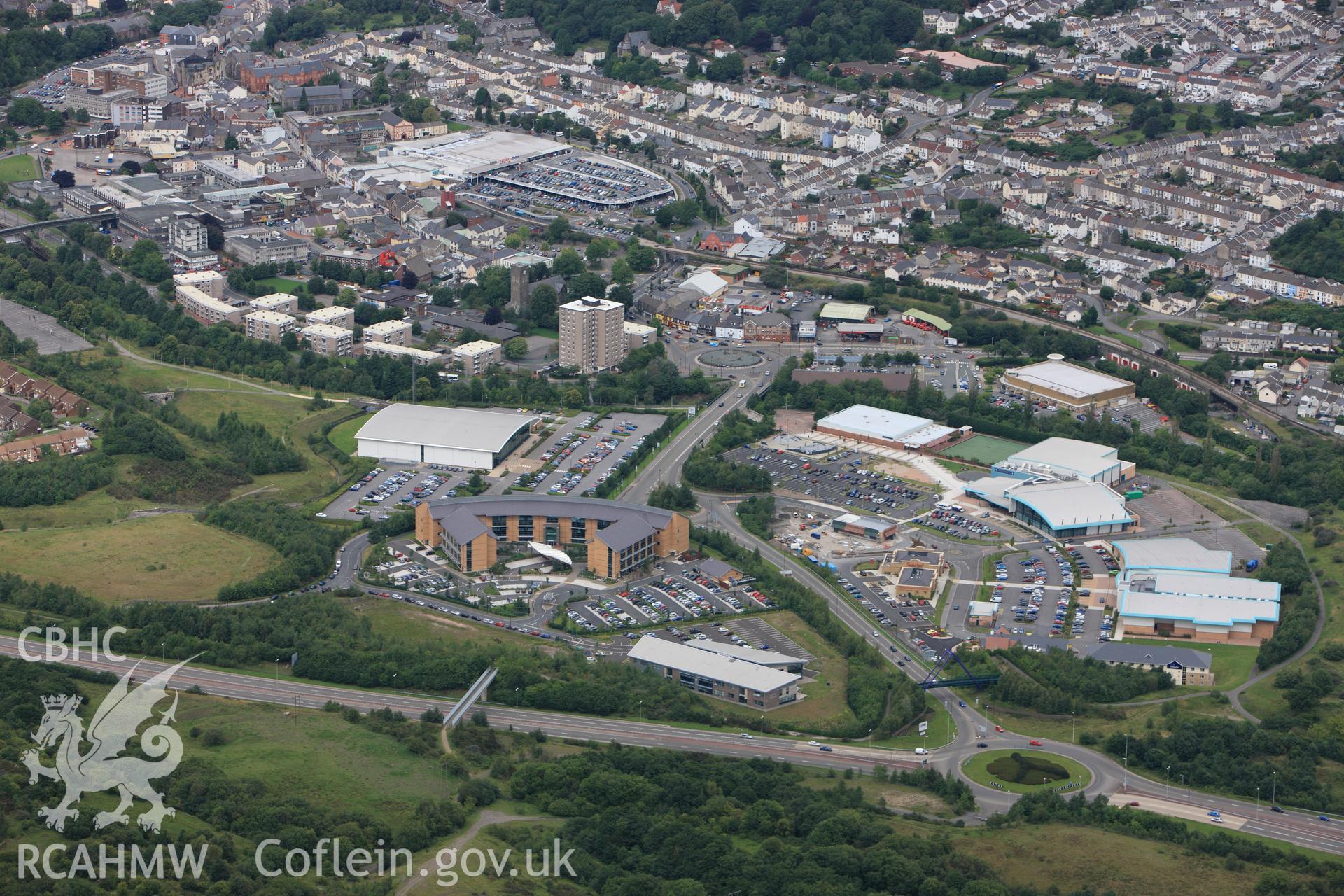 RCAHMW colour oblique photograph of Merthyr Tydfil, from the south showing the Welsh Assembly Government building in the foreground. Taken by Toby Driver on 29/07/2010.
