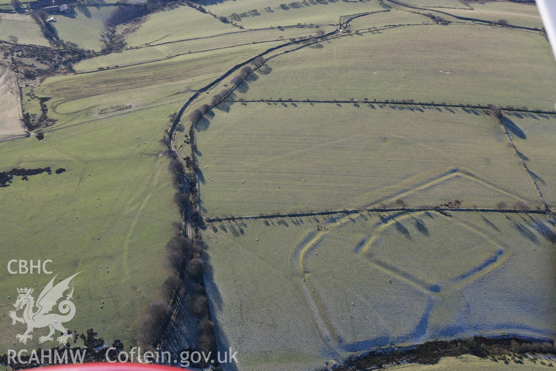 RCAHMW colour oblique photograph of Moel Ton-mawr hillfort. Taken by Toby Driver on 08/12/2010.