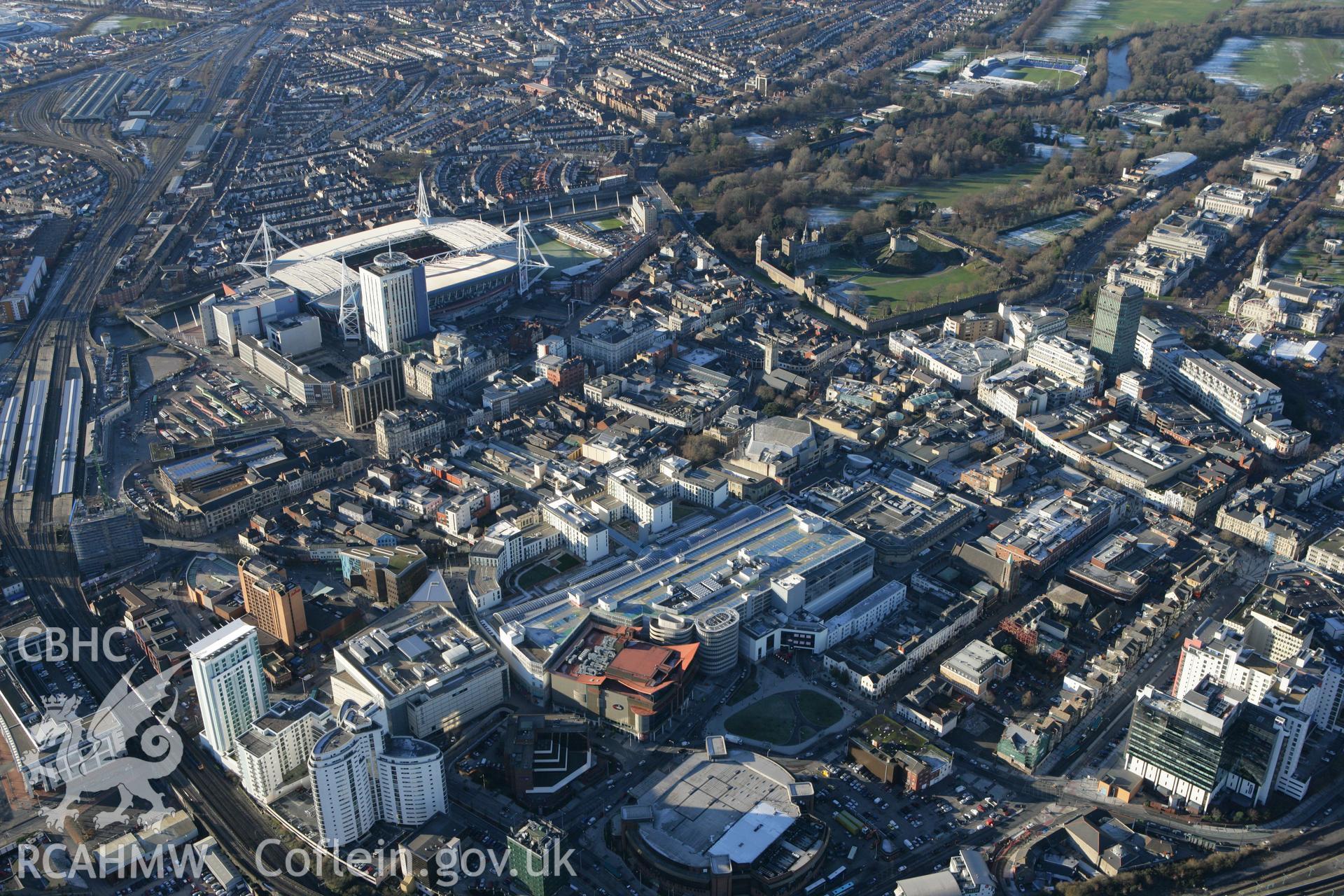 RCAHMW colour oblique photograph of Cardiff city centre from the east, showing the Millenium Stadium. Taken by Toby Driver on 08/12/2010.