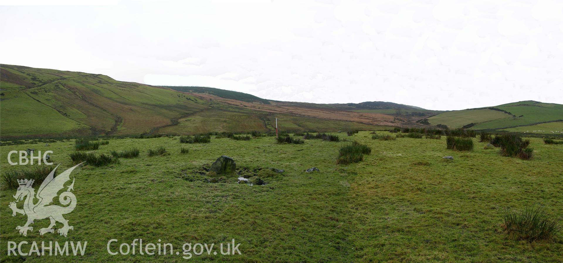 Colour digital photograph showing view of Y Capel Stone Circle Mg179 with Esgair Cwmowen to left and Mynydd Pistyll Du to right - part of archaeological desk based assessment for Esgair Cwmowen, Carno (CAP Report 549).
