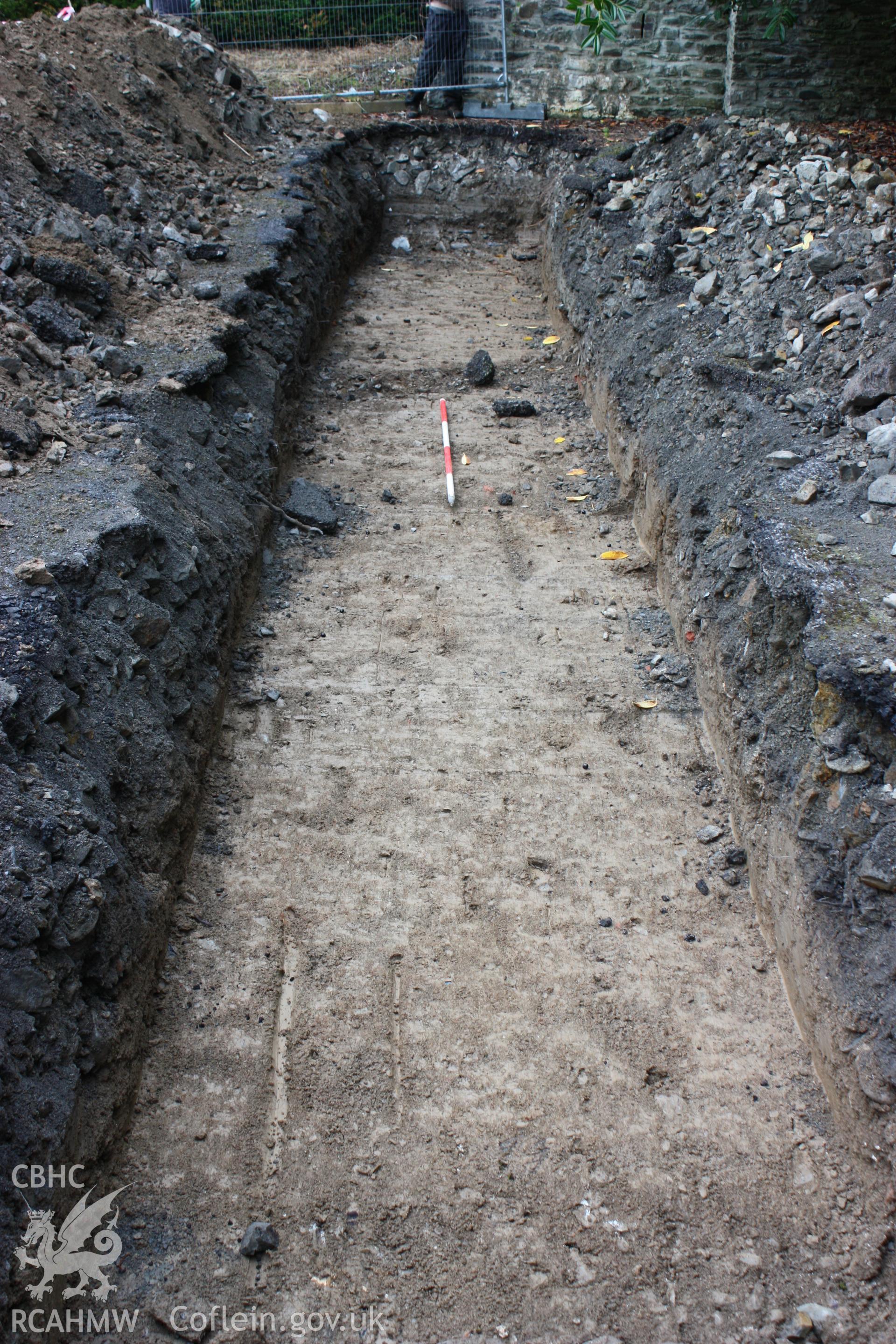 Digital photograph showing Trench 2 looking NE - part of archaeological field evaluation at Trawscoed Mansion, Trawscoed, produced by Cambrian Archaeological Projects Ltd.