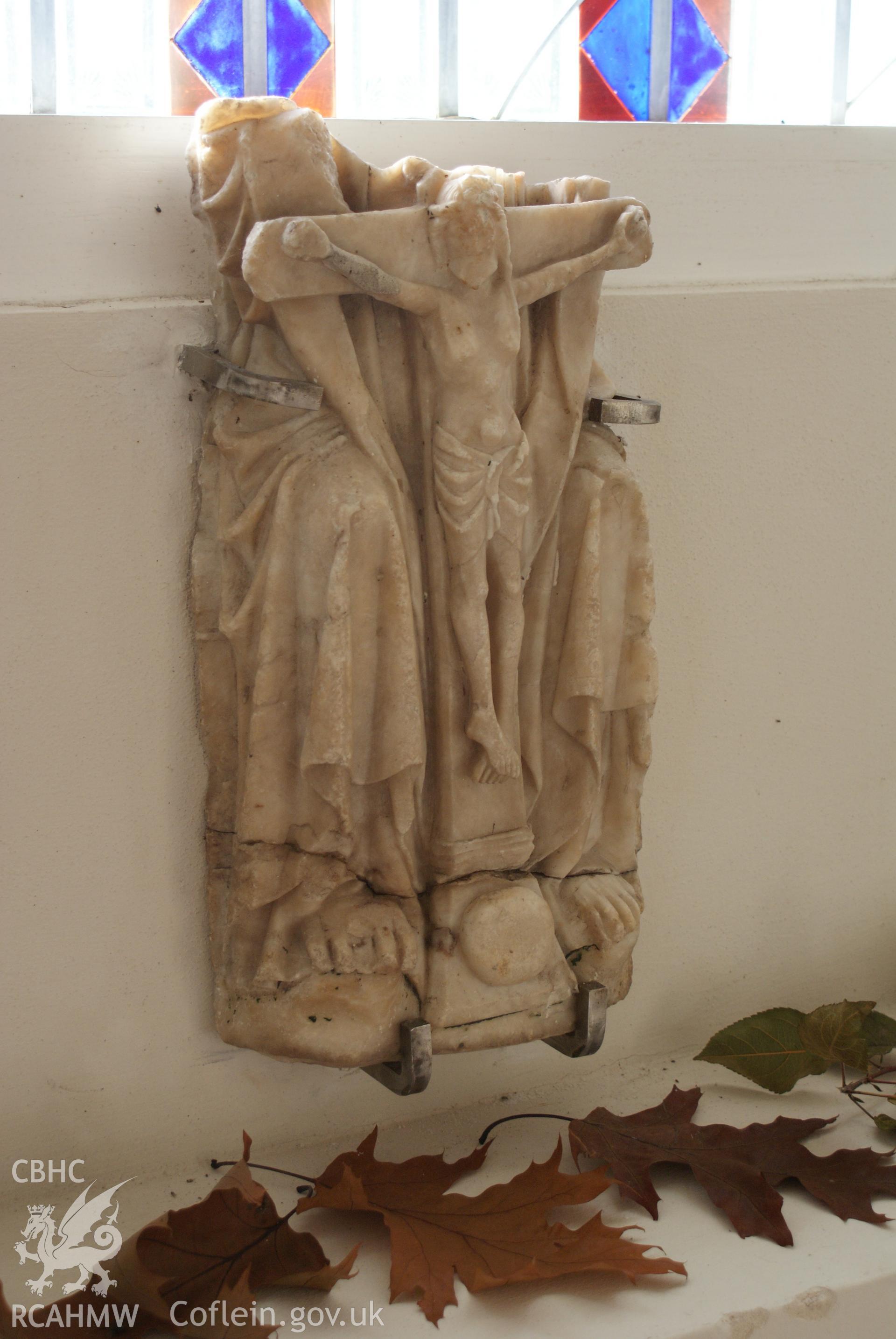 Digital colour photograph showing alabaster relief at St Mary and St Michael Catholic church, Llanarth.