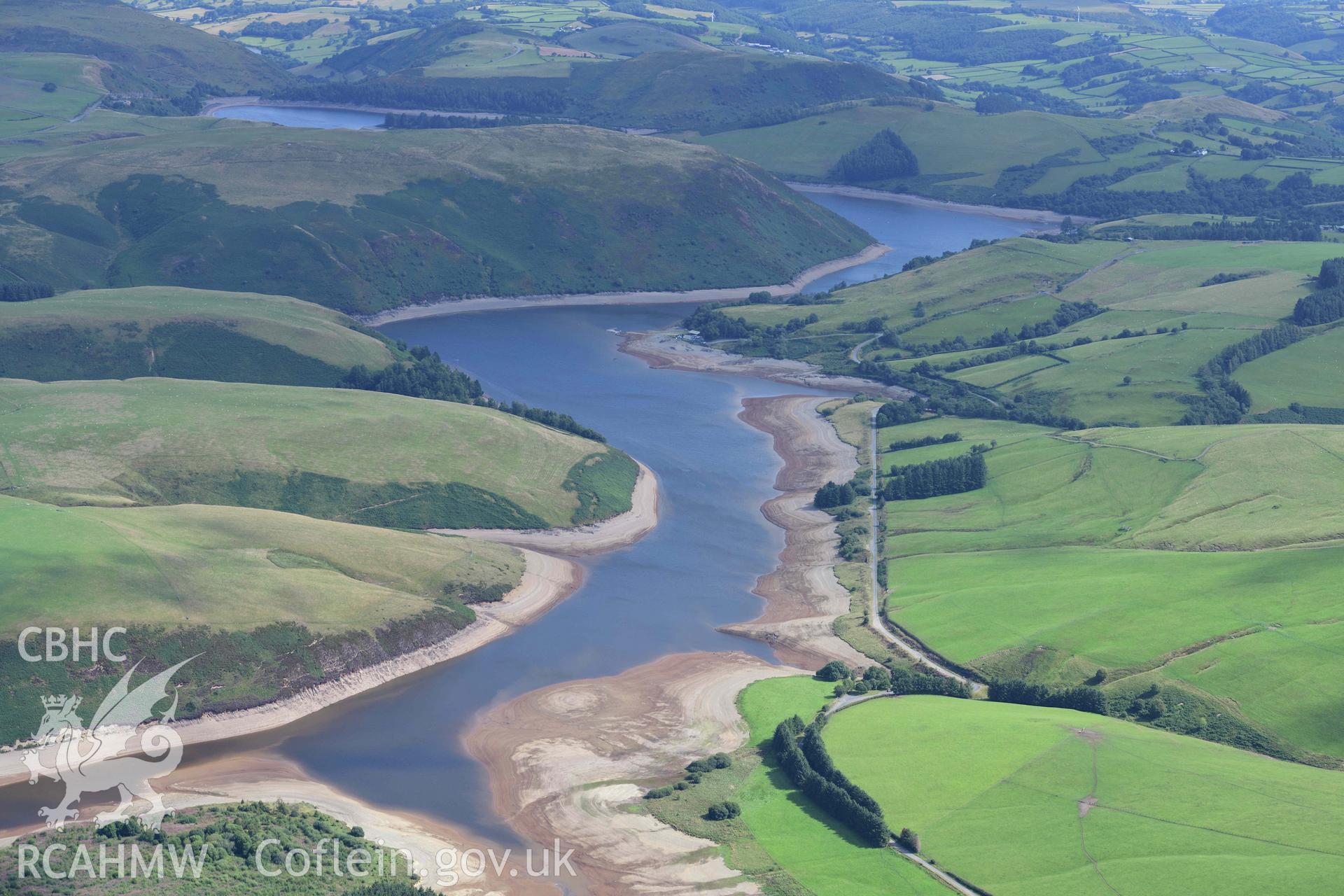 View of Llyn Clywedog Reservoir under drought conditions. Oblique aerial photograph taken during the Royal Commission’s programme of archaeological aerial reconnaissance by Toby Driver on 19 August 2022.