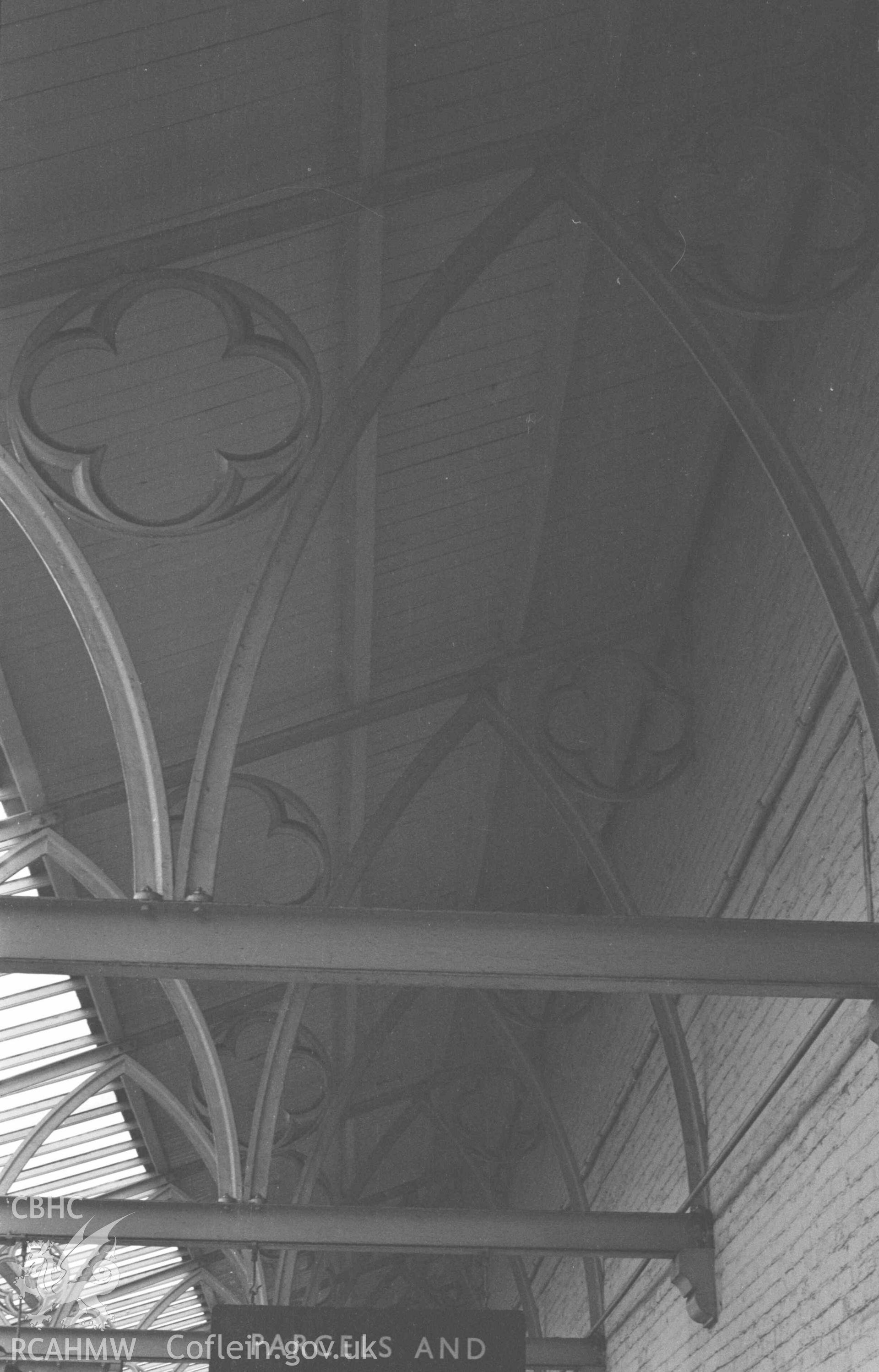 Digital copy of a black and white negative showing detailed view of iron roof gurders above Platform 1 at Abersytwyth Railway Station. Photographed by Arthur Chater on 3 January 1969. Looking south east from Grid Reference SN 5852 8157.