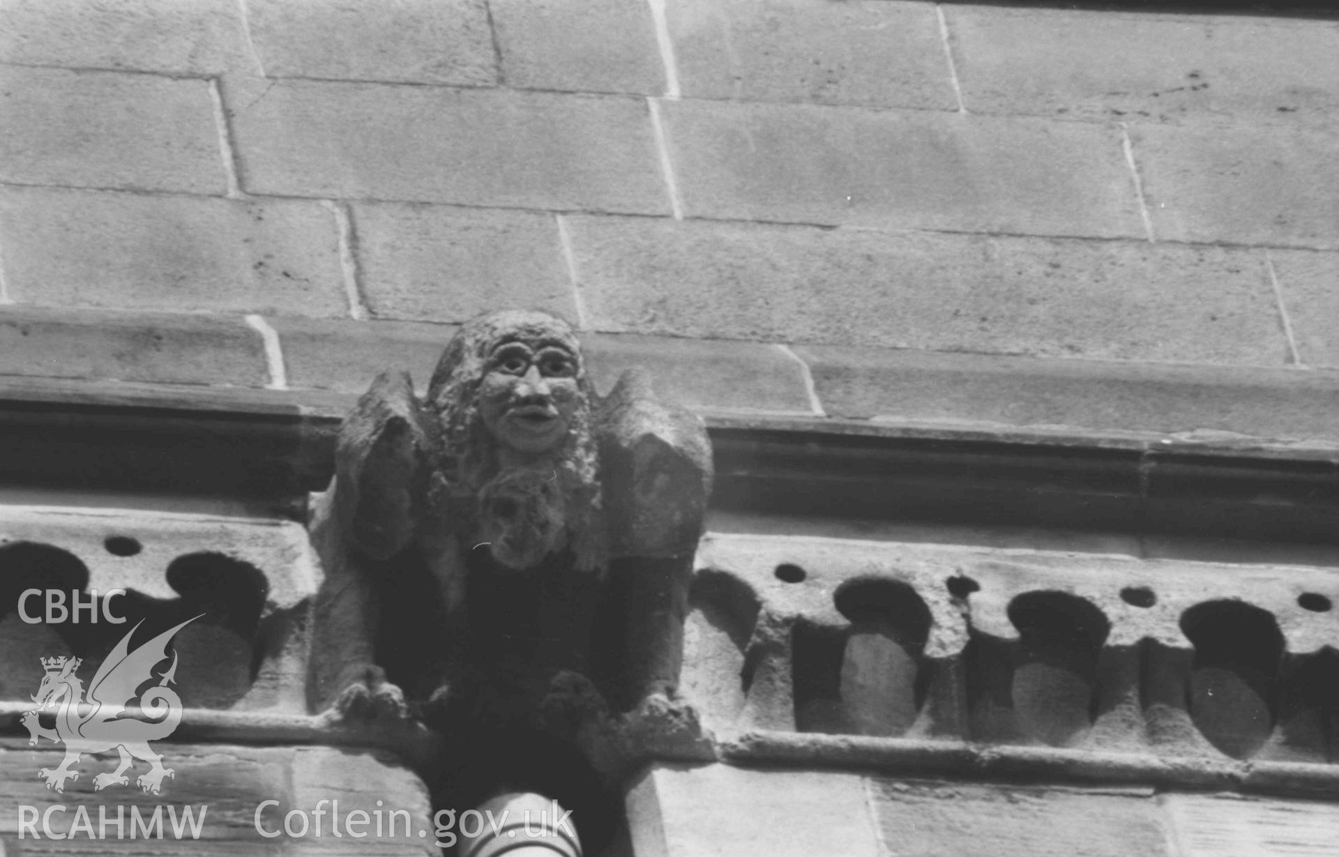 Digital copy of a black and white negative showing gargoyles on the south east side of the UCW building overlooking King Street, Aberystwyth (Telephoto). Photographed by Arthur Chater on 2 April 1969. Grid Reference SN 581 817.