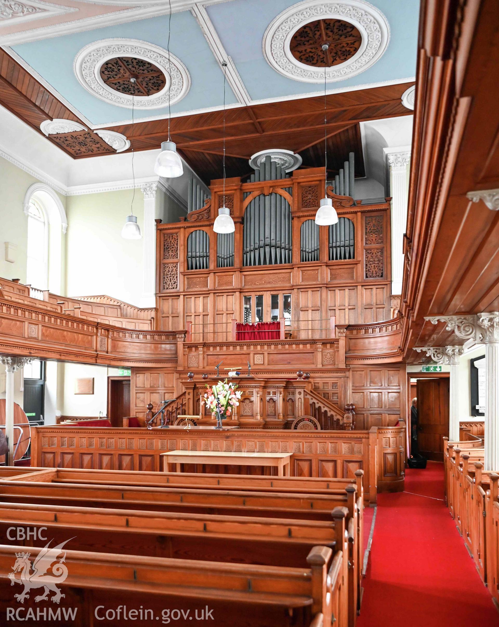 Capel Moreia, interior looking north-east towards pulpit, sedd fawr, and organ.