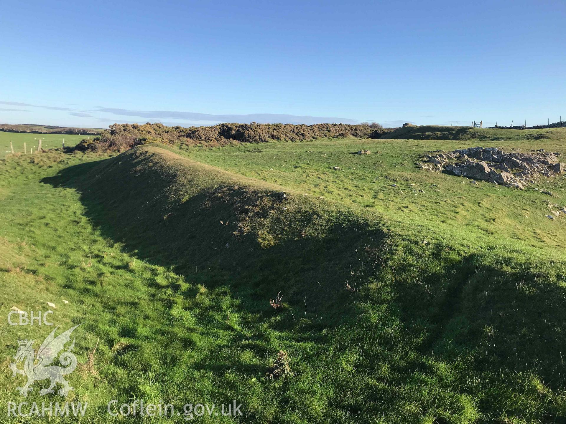 Digital photograph of outer rampart of the Knave promontory fort, produced by Paul Davis in 2020