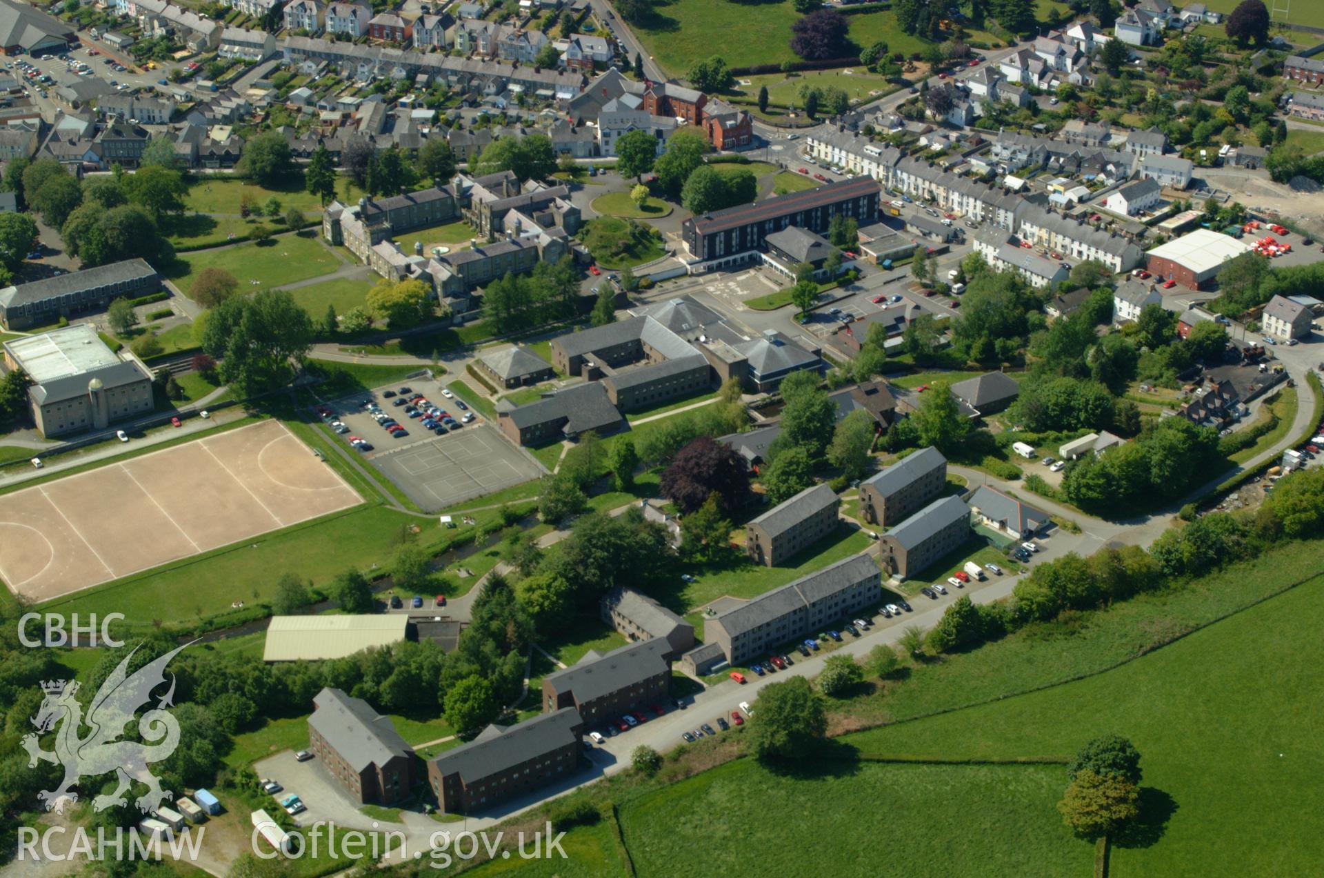 RCAHMW colour oblique aerial photograph of St David's College, Lampeter taken on 24/05/2004 by Toby Driver