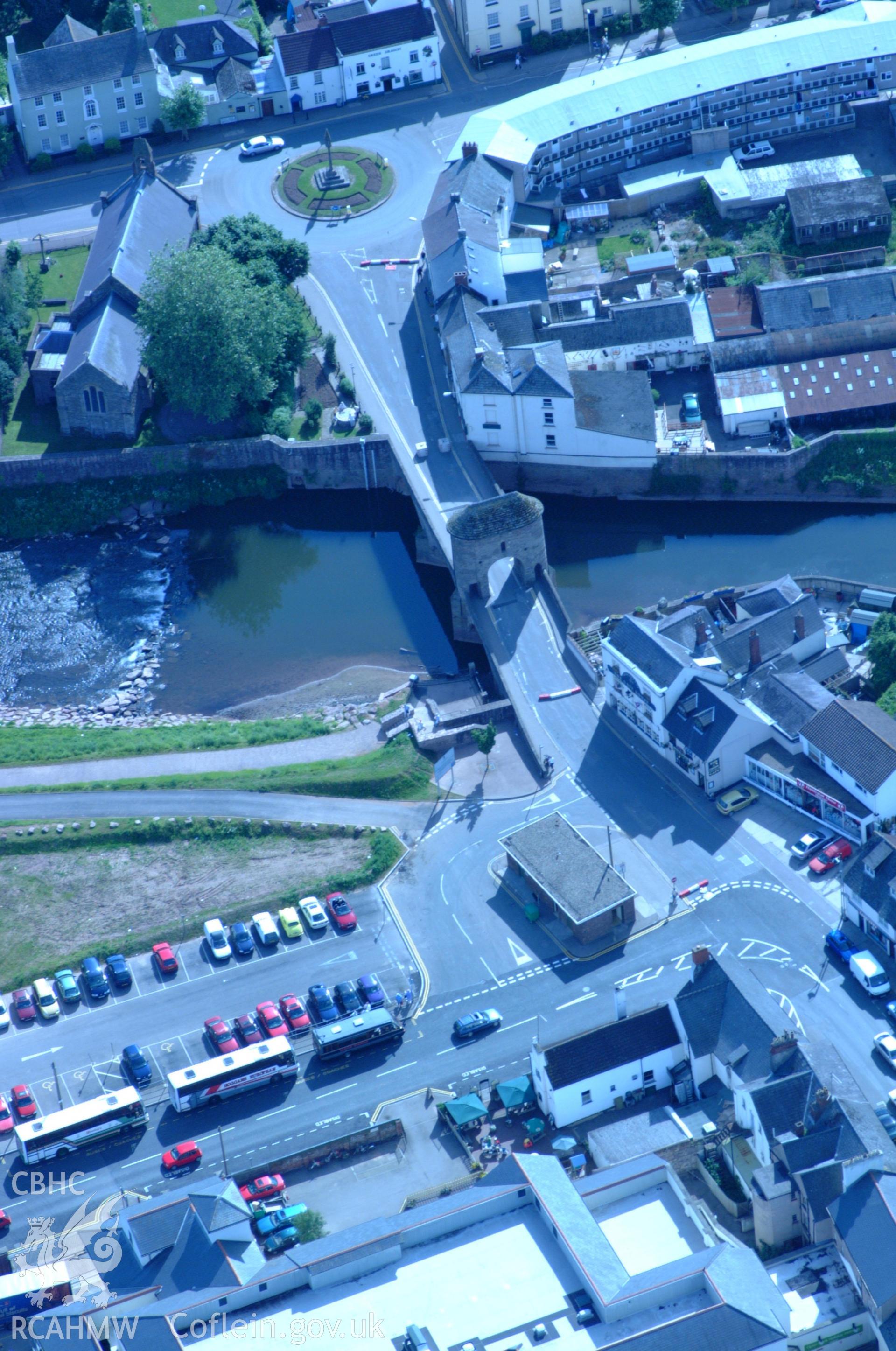 RCAHMW colour oblique aerial photograph of Monnow Bridge and Gate, Monmouth taken on 02/06/2004 by Toby Driver