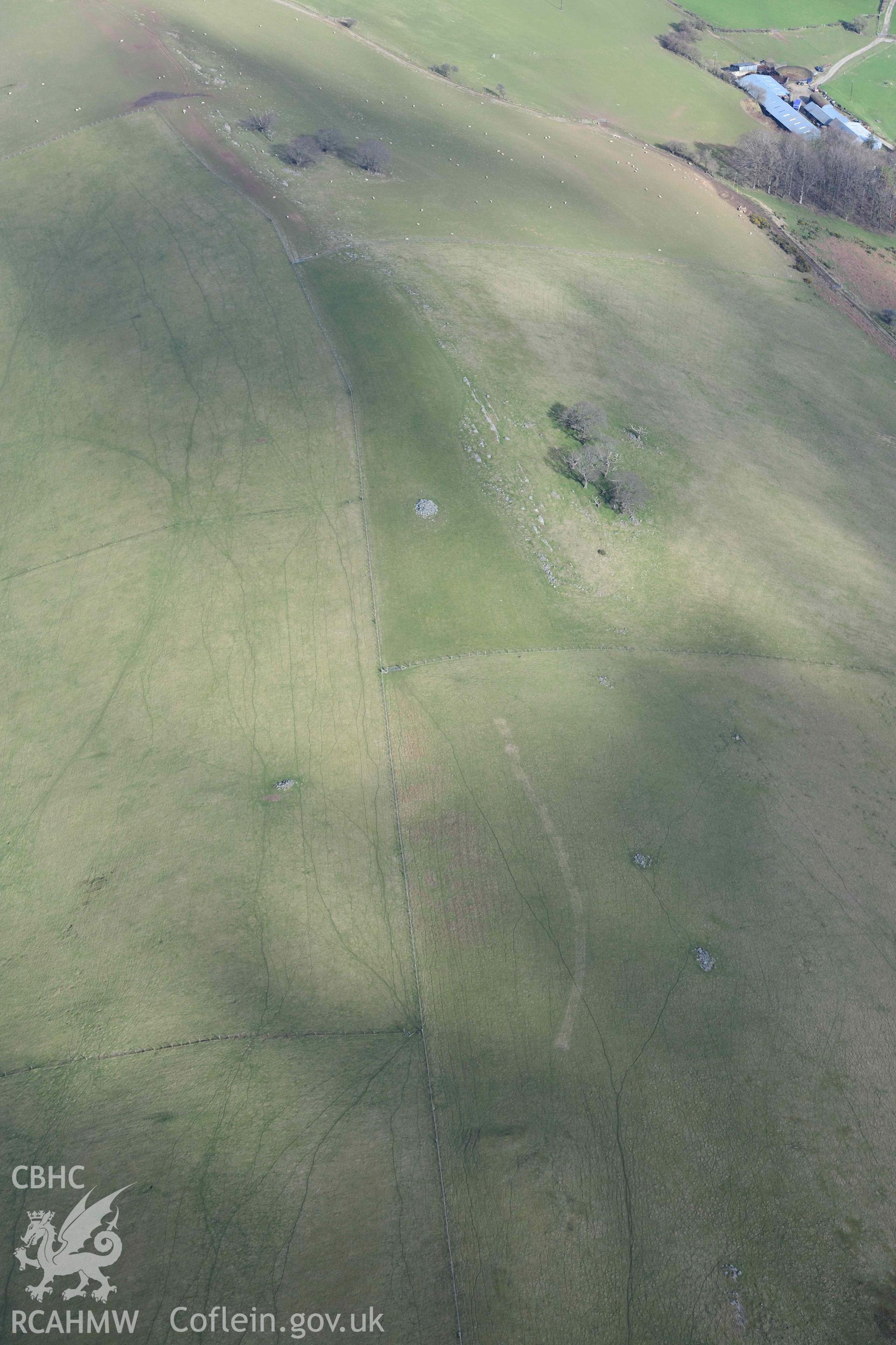 Dol y Fan cairn. Oblique aerial photograph taken during the Royal Commission’s programme of archaeological aerial reconnaissance by Toby Driver on 14 March 2022.