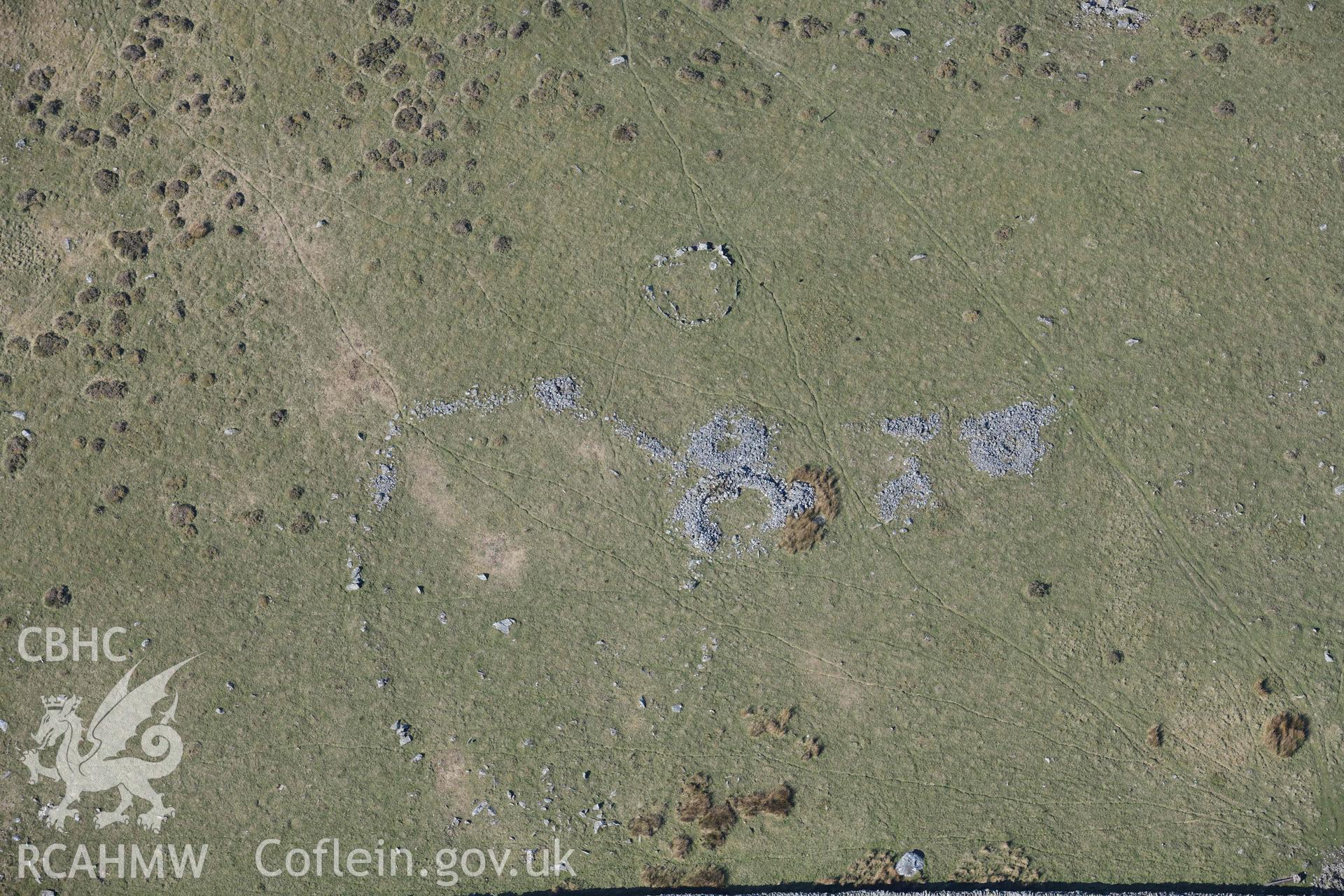 Mynydd Egryn hut circle settlement and Hengwm cairn circle. Oblique aerial photographs taken during the Royal Commission’s programme of archaeological aerial reconnaissance by Toby Driver on 25 March 2022.