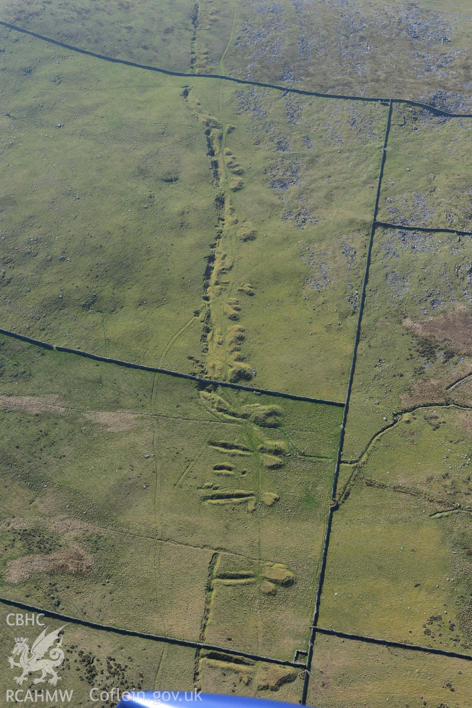 Ergyn and Hafotty manganese mines, view from the south. Oblique aerial photograph taken during the Royal Commission’s programme of archaeological aerial reconnaissance by Toby Driver on 25 March 2022.