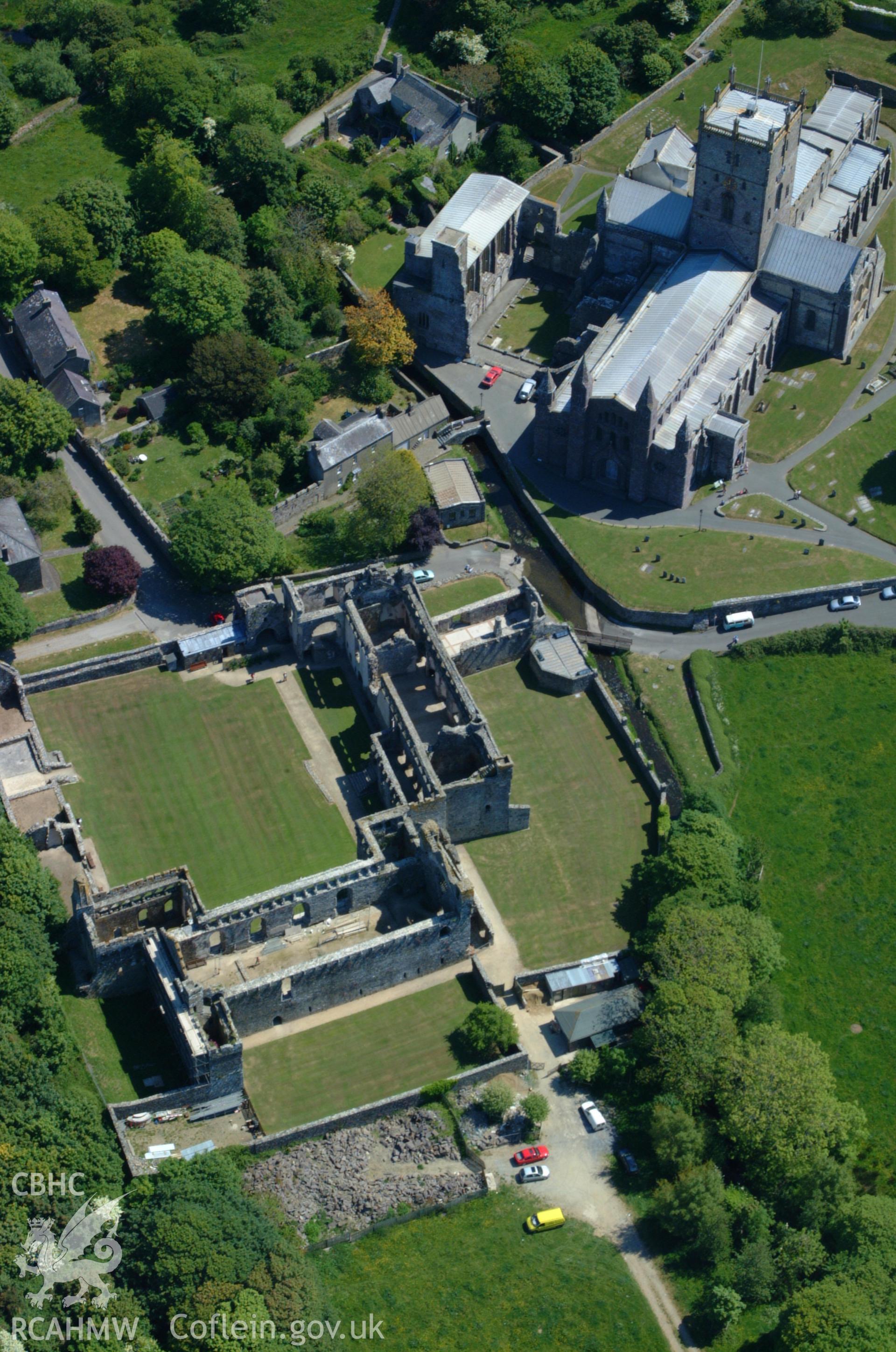 RCAHMW colour oblique aerial photograph of St David's Cathedral taken on 25/05/2004 by Toby Driver