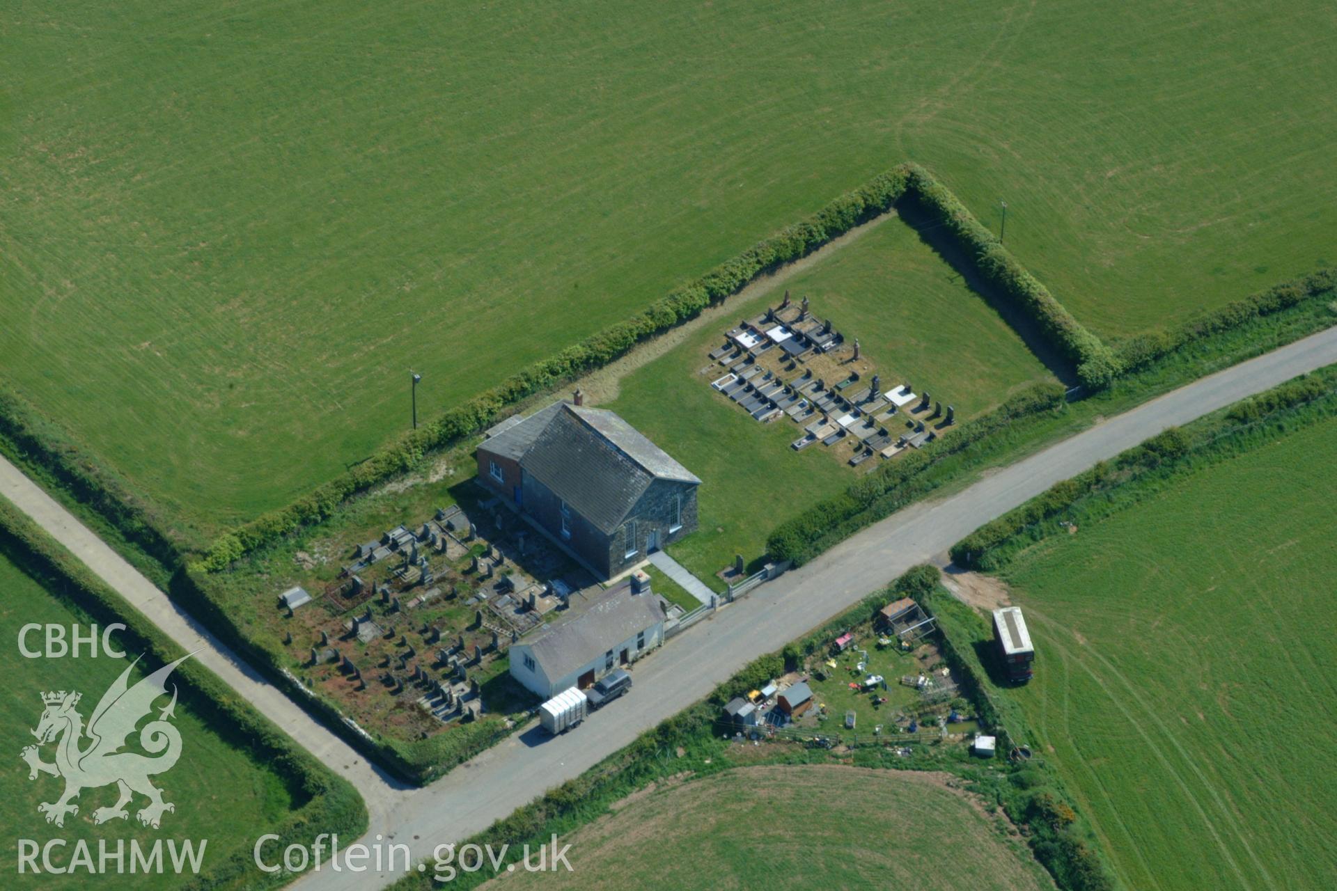RCAHMW colour oblique aerial photograph of Penuel Welsh Baptist Church, Rhydymaen Cemaes taken on 24/05/2004 by Toby Driver