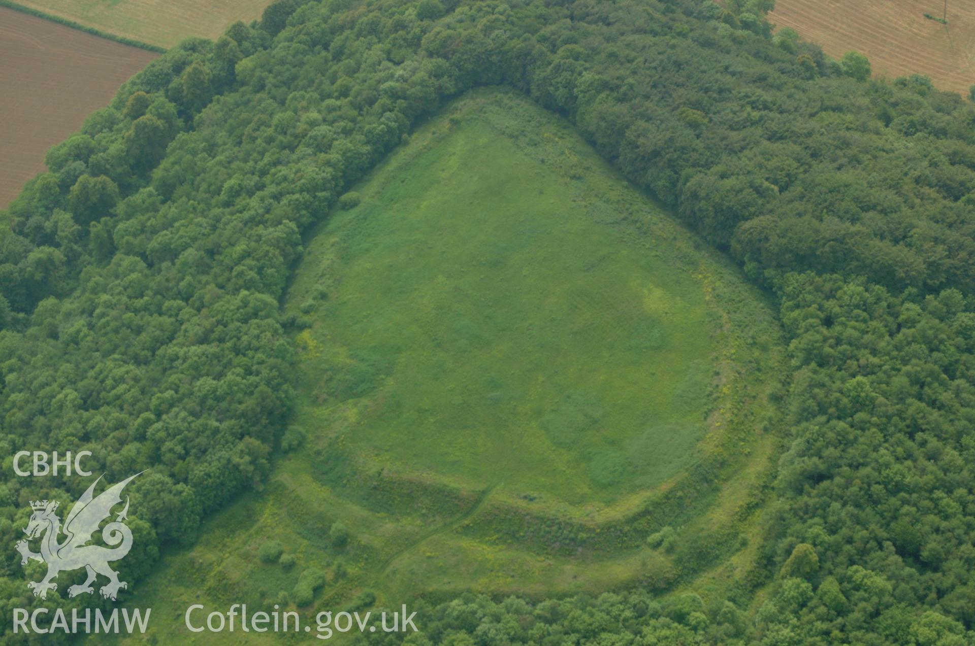 RCAHMW colour oblique aerial photograph of Llanmelin Wood Hillfort taken on 26/05/2004 by Toby Driver