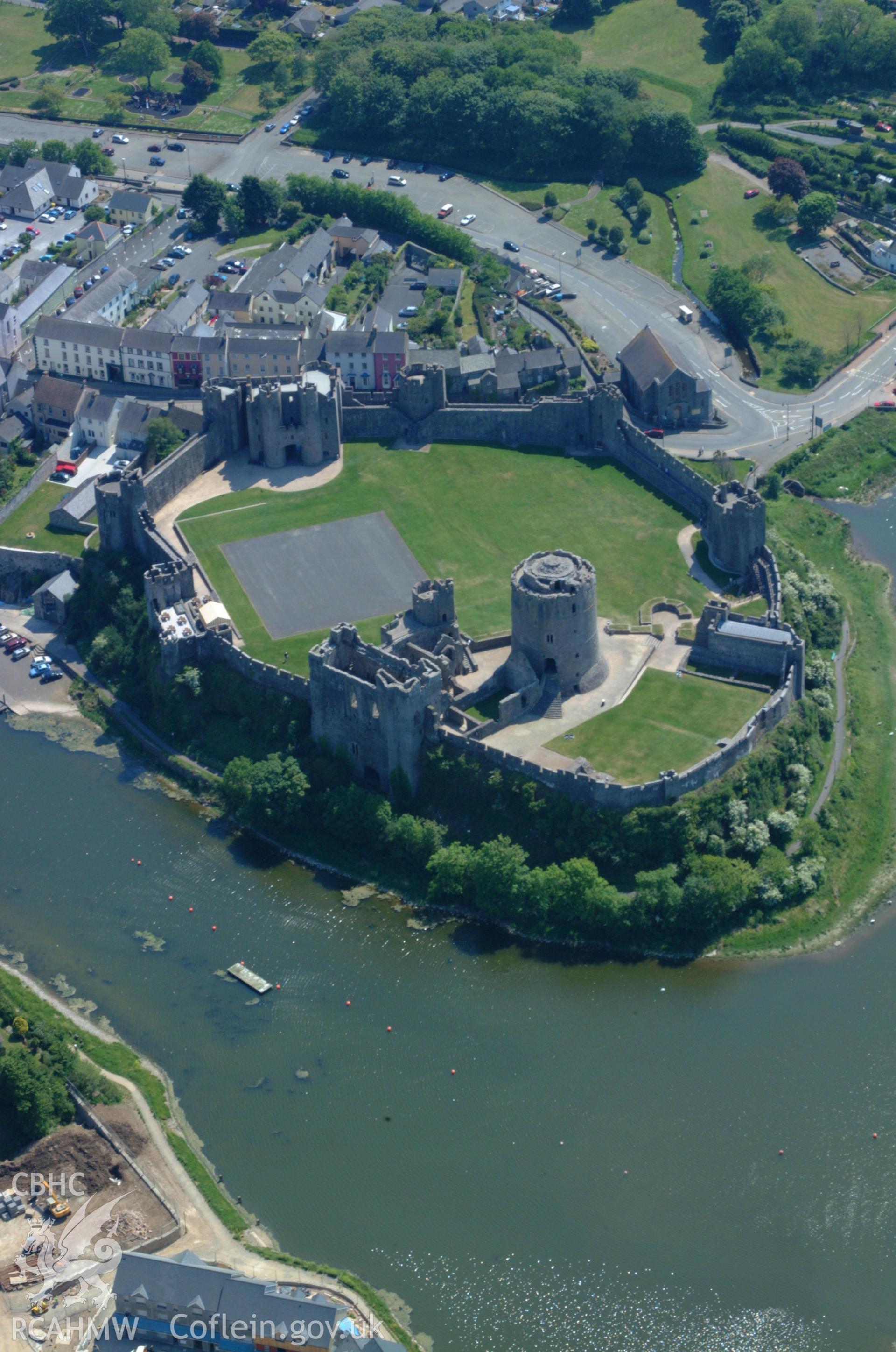 RCAHMW colour oblique aerial photograph of Pembroke Castle taken on 24/05/2004 by Toby Driver