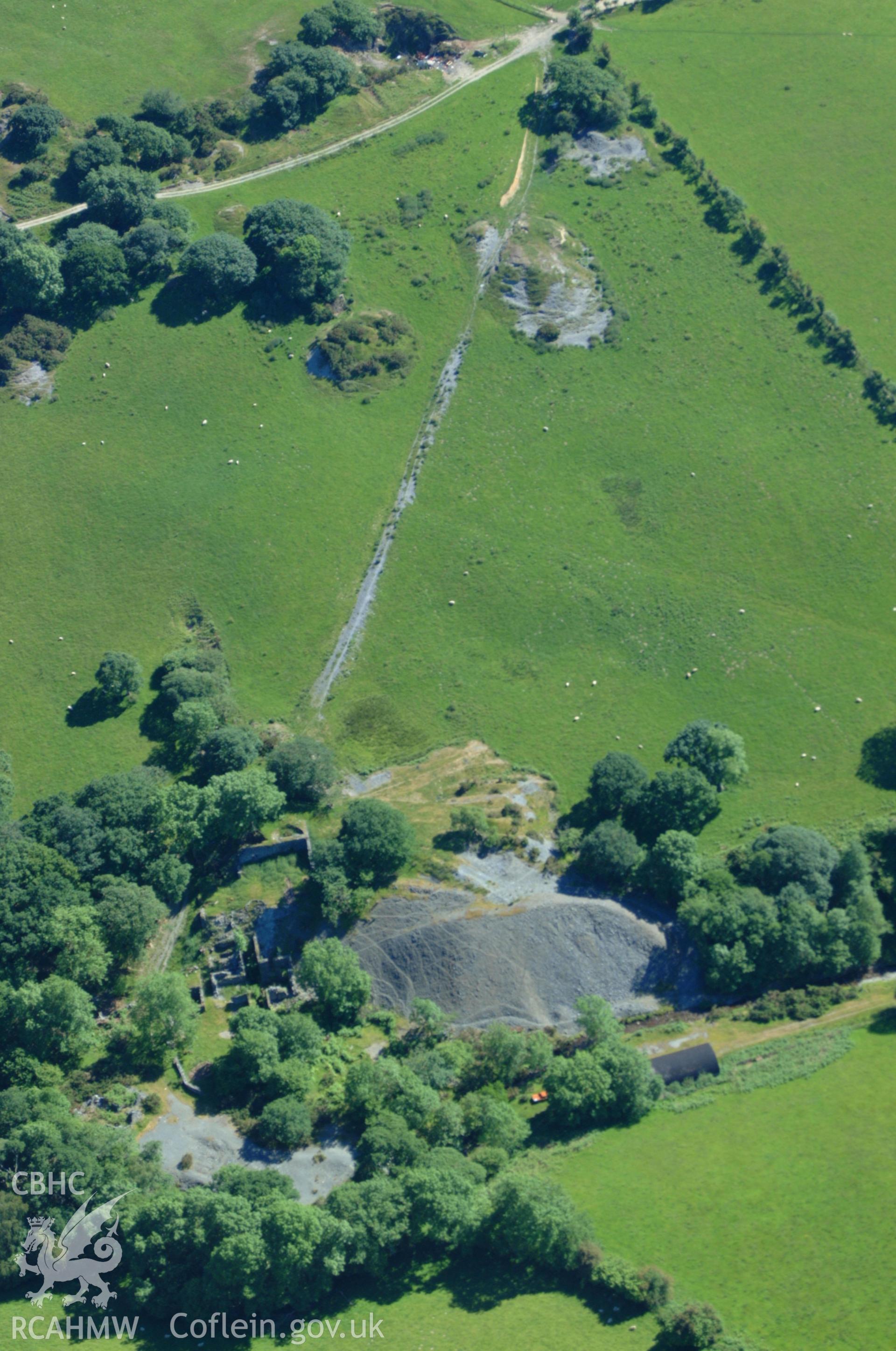 RCAHMW colour oblique aerial photograph of Gwaith Bron-floyd Lead Mine taken on 14/06/2004 by Toby Driver