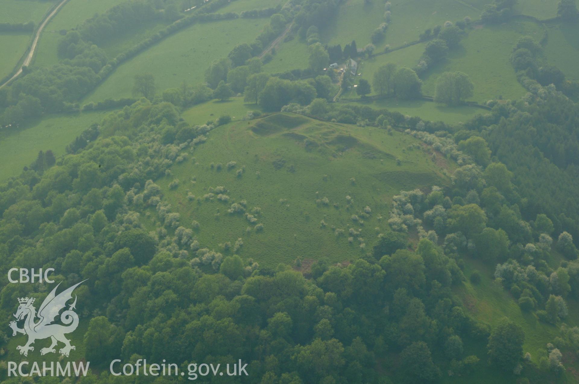 RCAHMW colour oblique aerial photograph of Twyn-y-gaer Camp taken on 27/05/2004 by Toby Driver