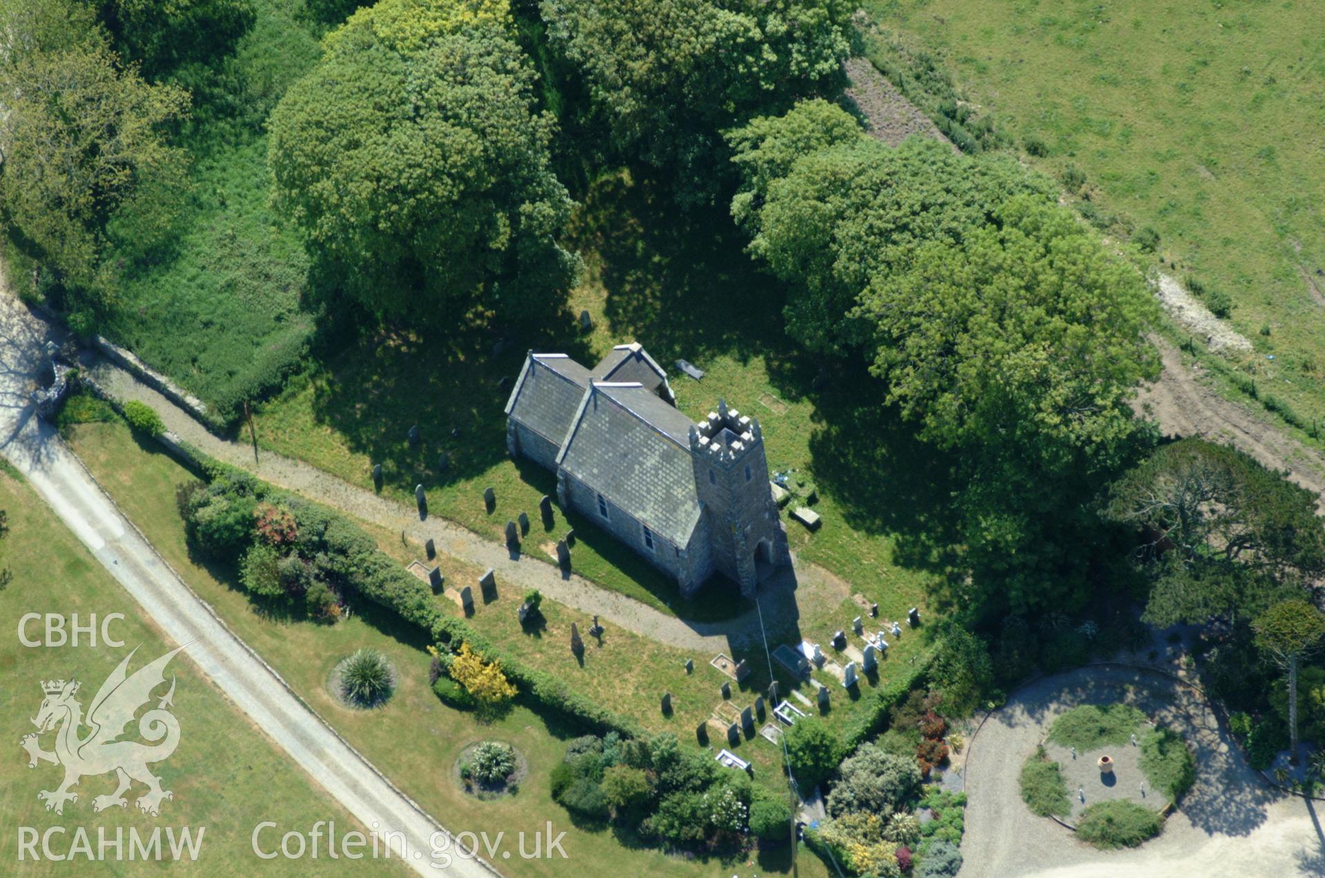 RCAHMW colour oblique aerial photograph of St Cwrda's Church taken on 25/05/2004 by Toby Driver