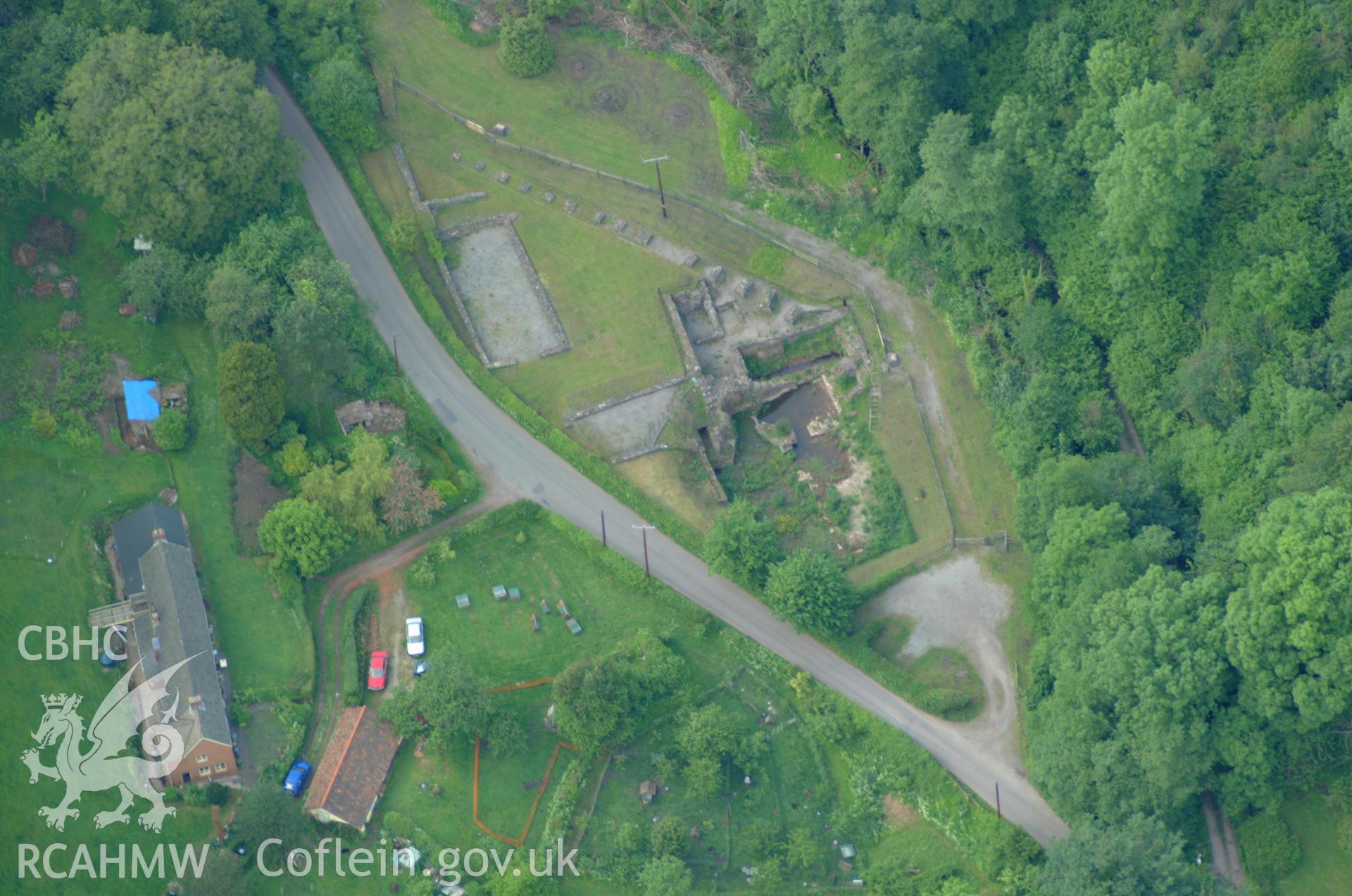 RCAHMW colour oblique aerial photograph of Tintern Blast Furnace taken on 02/06/2004 by Toby Driver