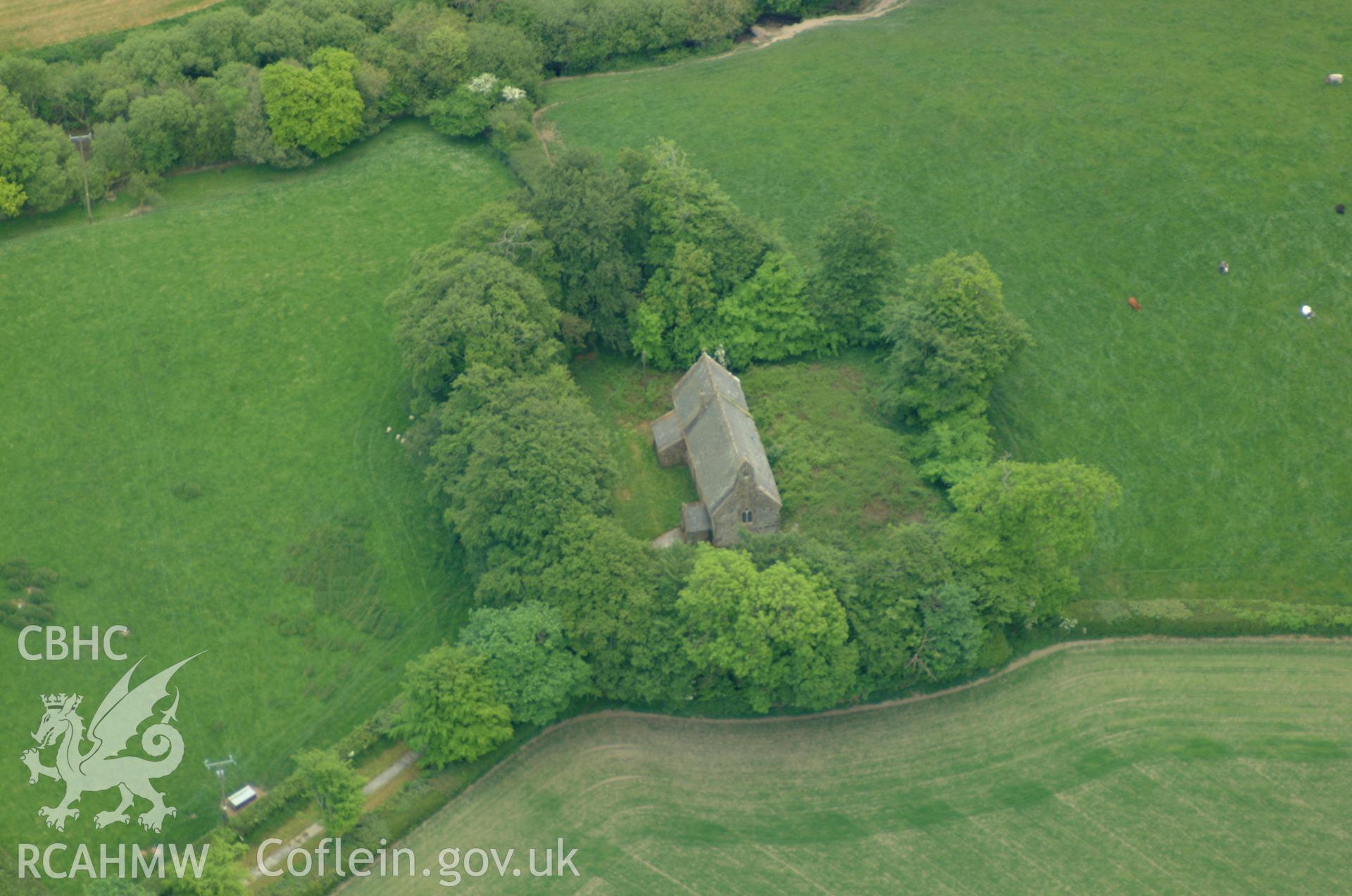 RCAHMW colour oblique aerial photograph of Llangan Church taken on 24/05/2004 by Toby Driver
