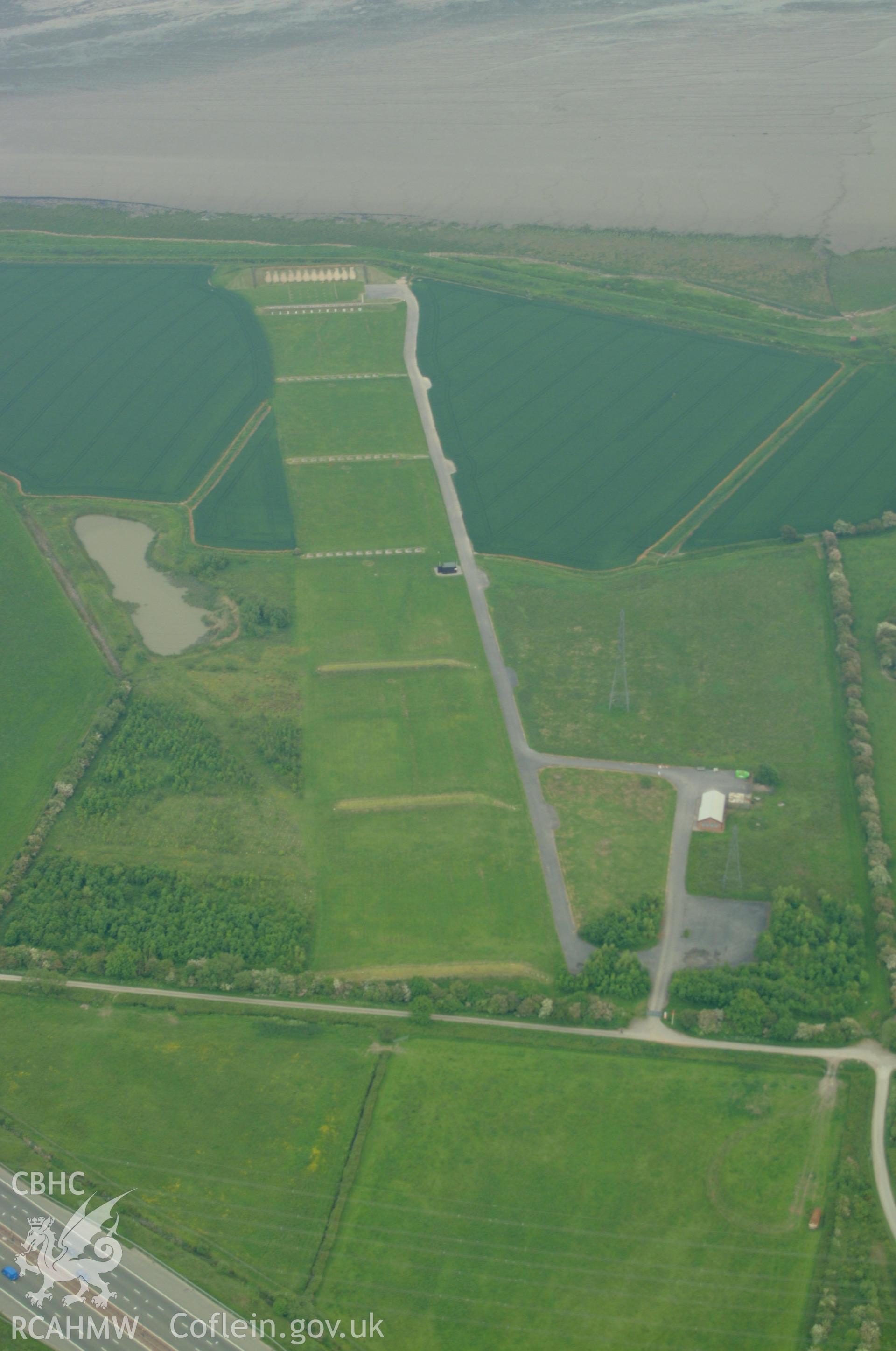 RCAHMW colour oblique aerial photograph of Rogiet Rifle Range taken on 27/05/2004 by Toby Driver