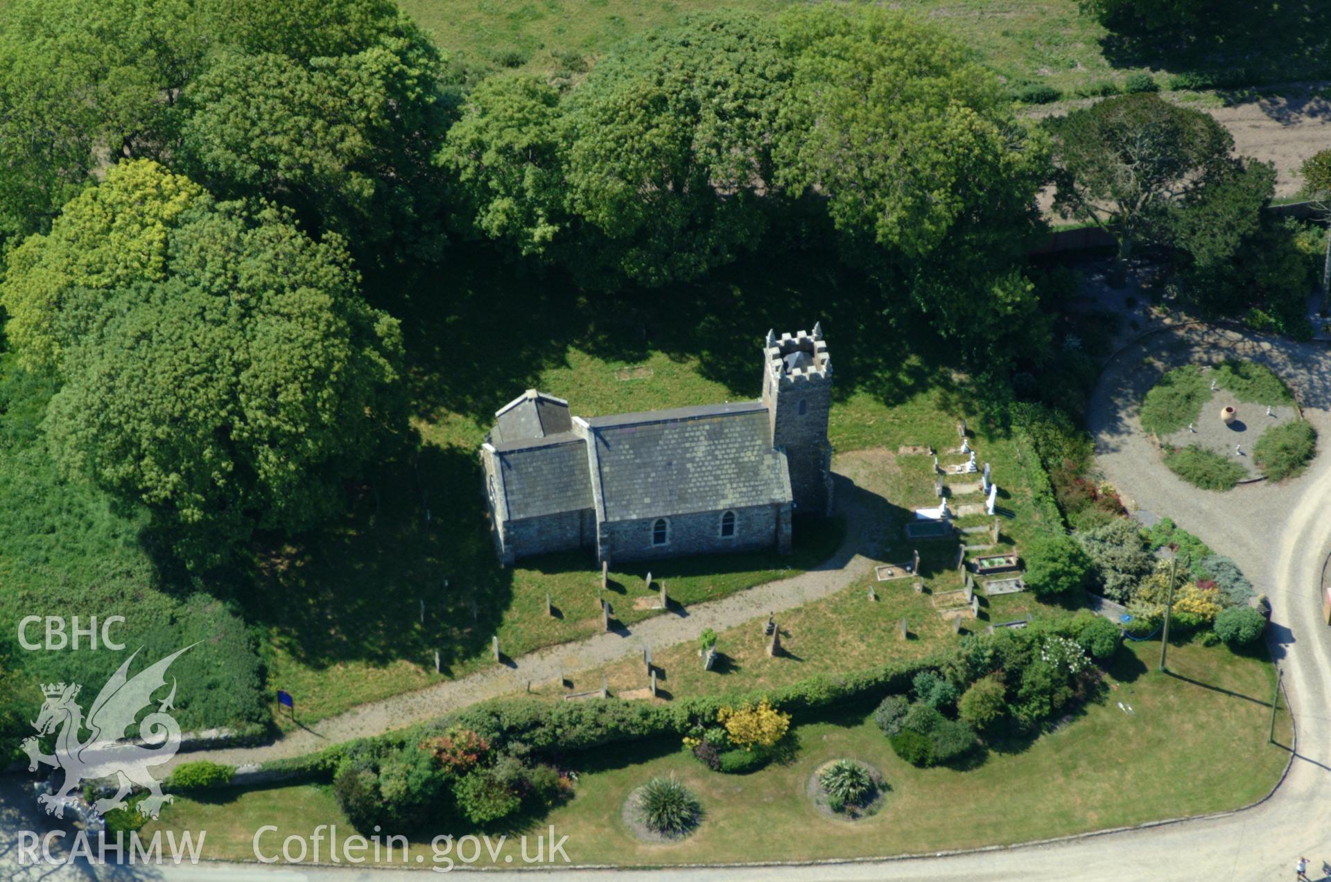 RCAHMW colour oblique aerial photograph of St Cwrda's Church taken on 25/05/2004 by Toby Driver