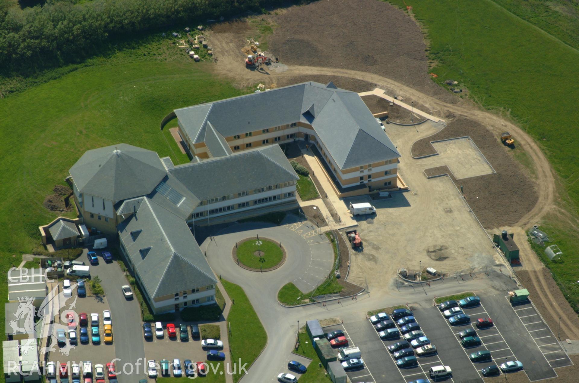 RCAHMW colour oblique aerial photograph of Penmorfa Council Buildings, Aberaeron. Taken on 24 May 2004 by Toby Driver
